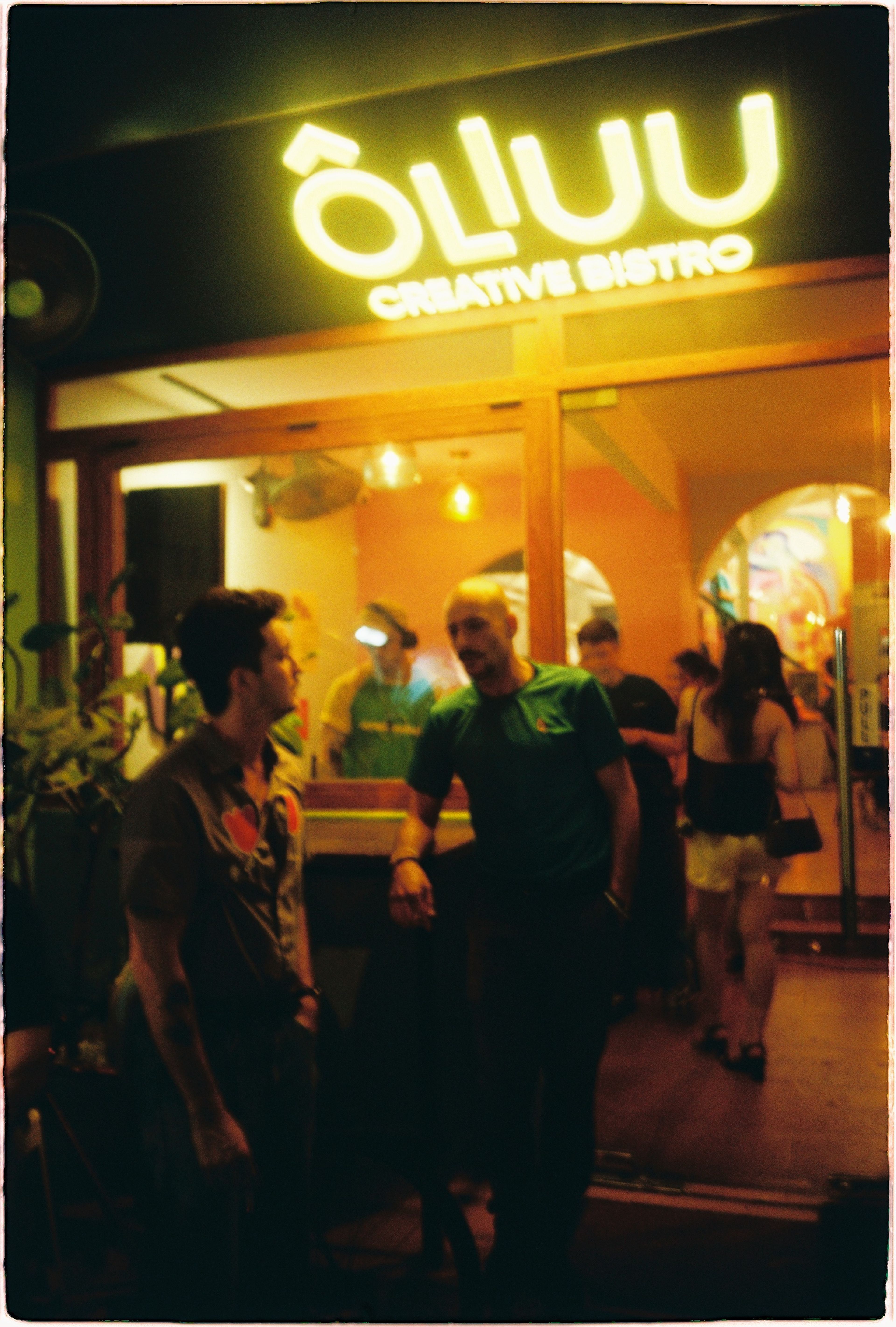 people talking in front of oliuu 