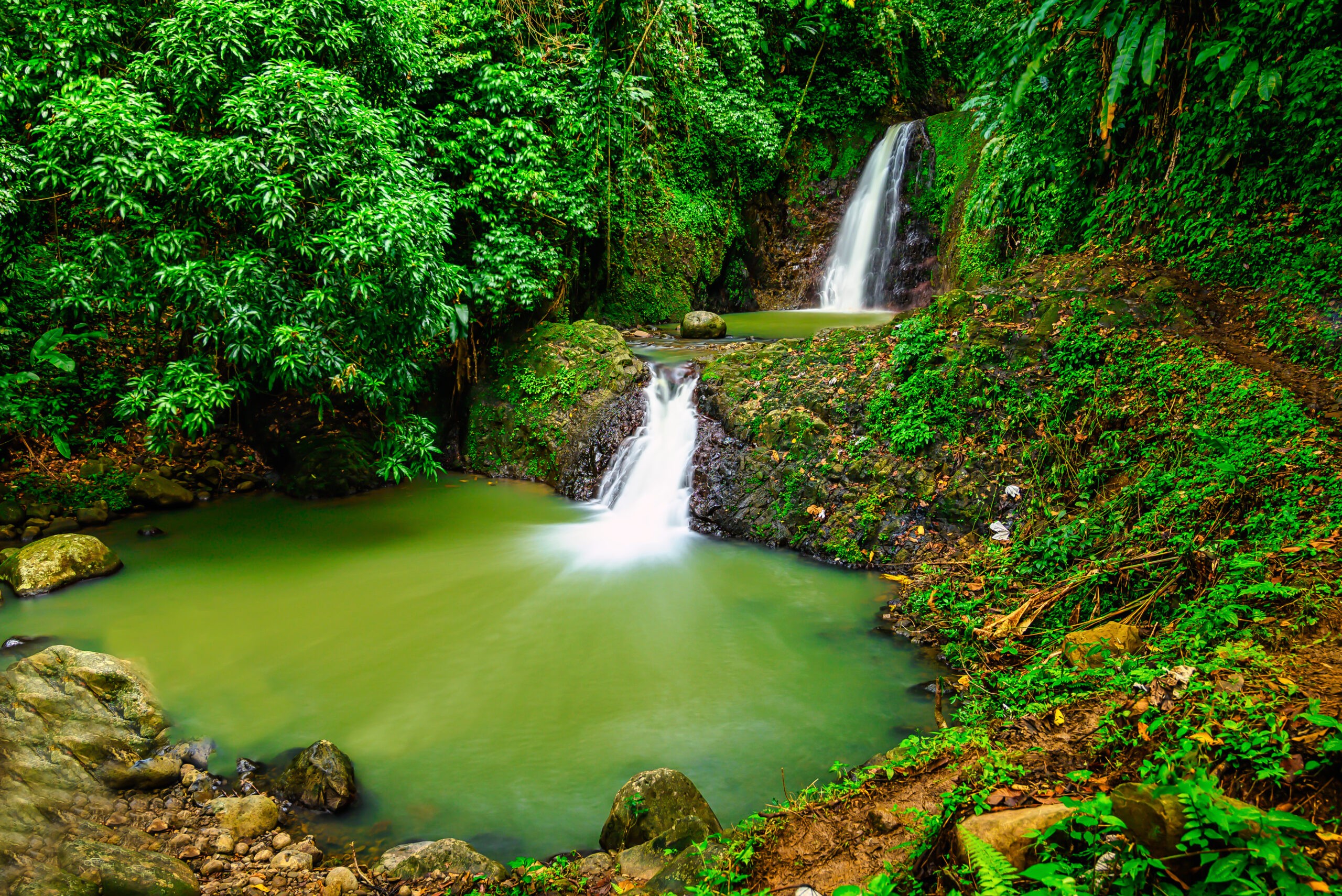 A view of Seven Sisters Waterfalls on Grenada. One recounting of the origin of the falls claims this: The sisters, pursued by a suitor, outwitted him by changing themselves into water./Getty Images