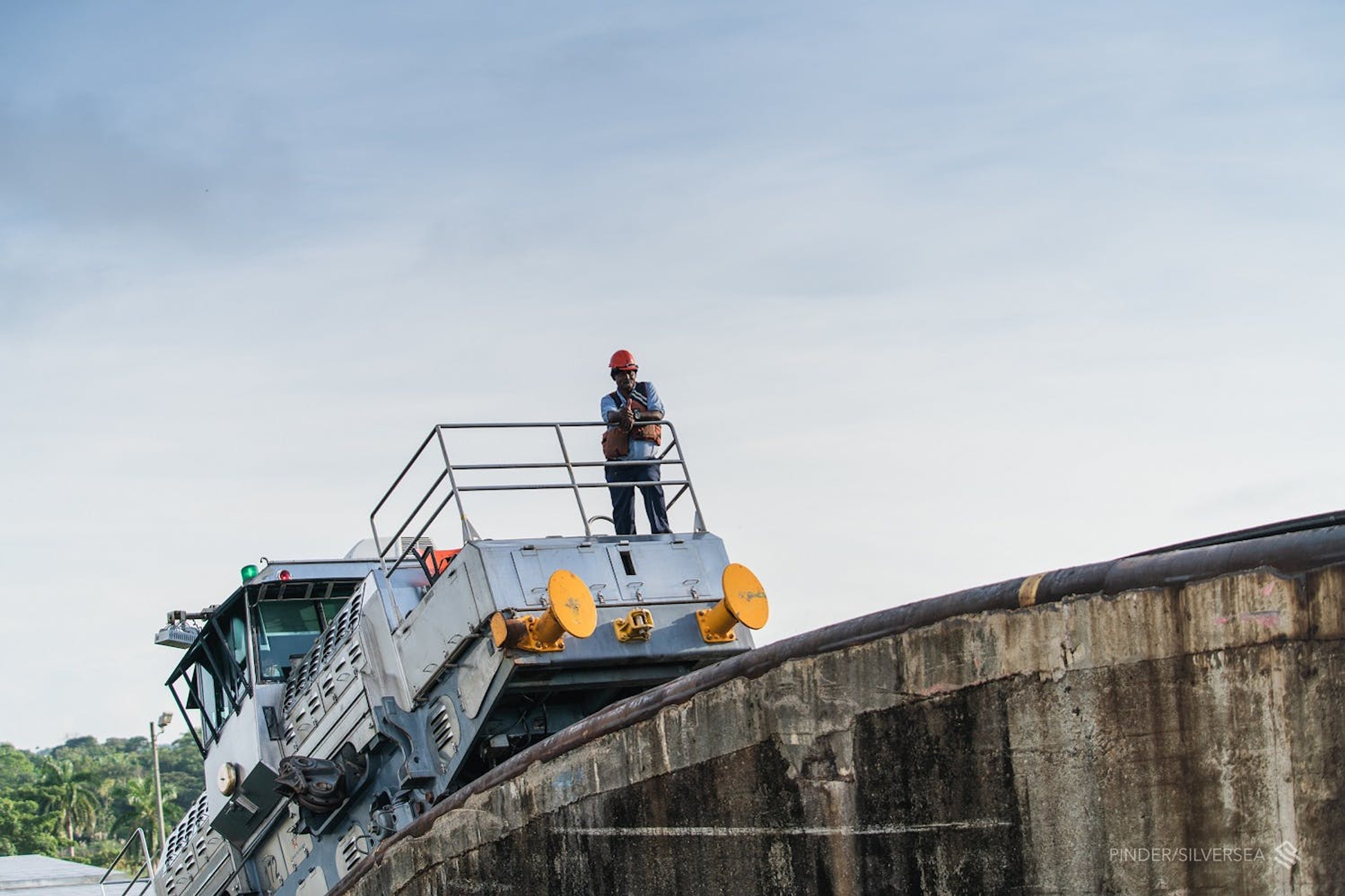 A lock operator welcomes Silversea's guests traveling aboard Silver Explorer/Lewis Harrison-Pinder