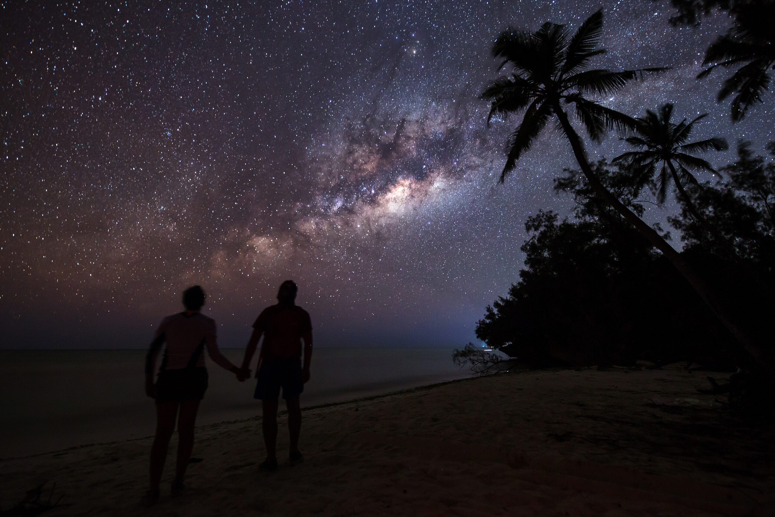 A couple stargazes in Zanzibar, off Tanzania, where Silversea expedition cruises call./Shutterstock