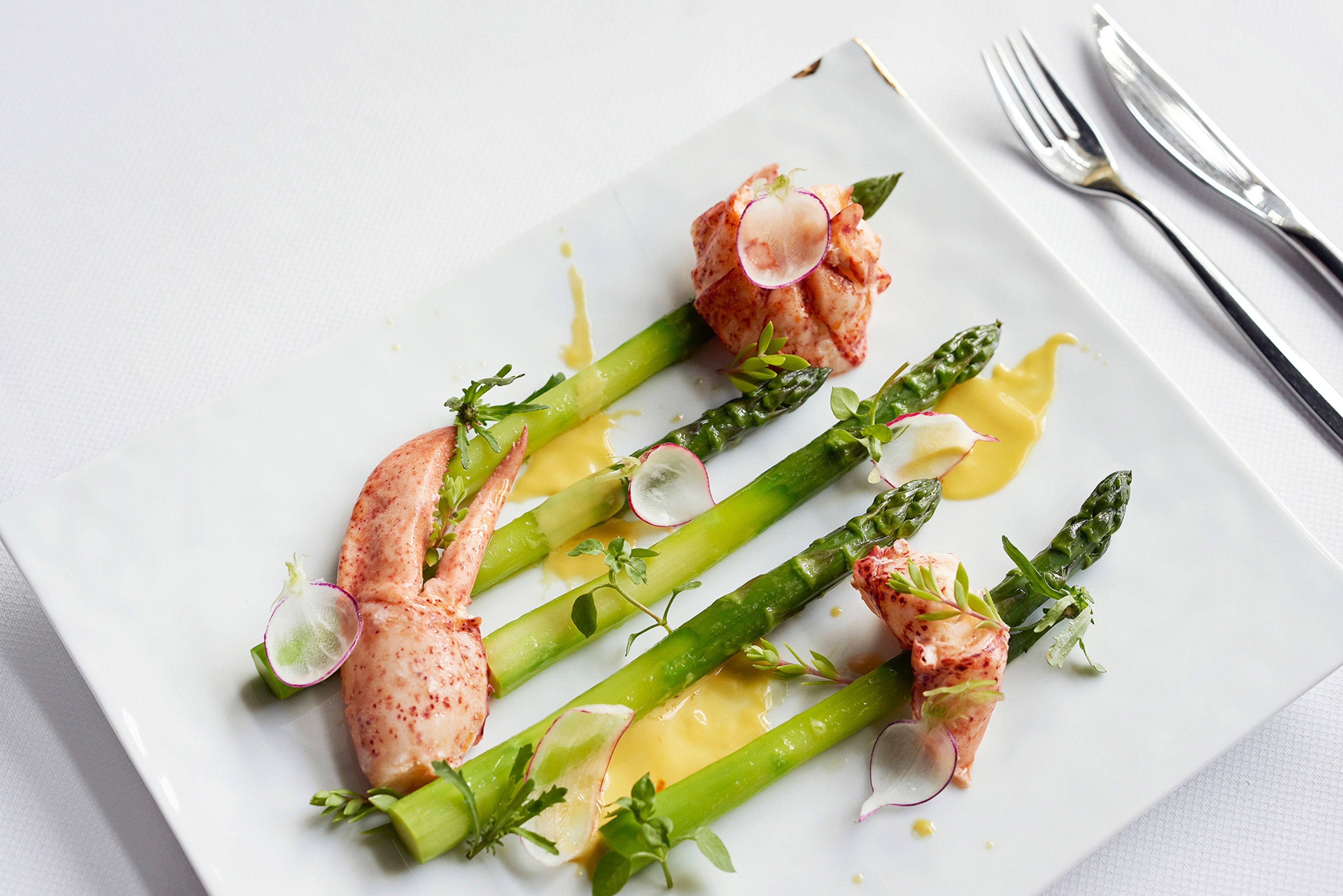 Asparagus and lobster at Toqué, the Montreal restaurants that accents local products./Photo courtesy Toqué