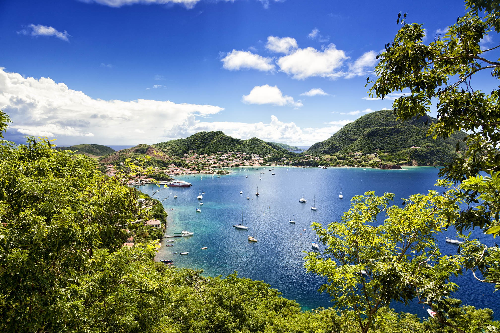 Town and bay of Terre-de-Haut, capital of Les Saintes islands, Guadeloupe archipelago, Caribbean Sea./ Shutterstock