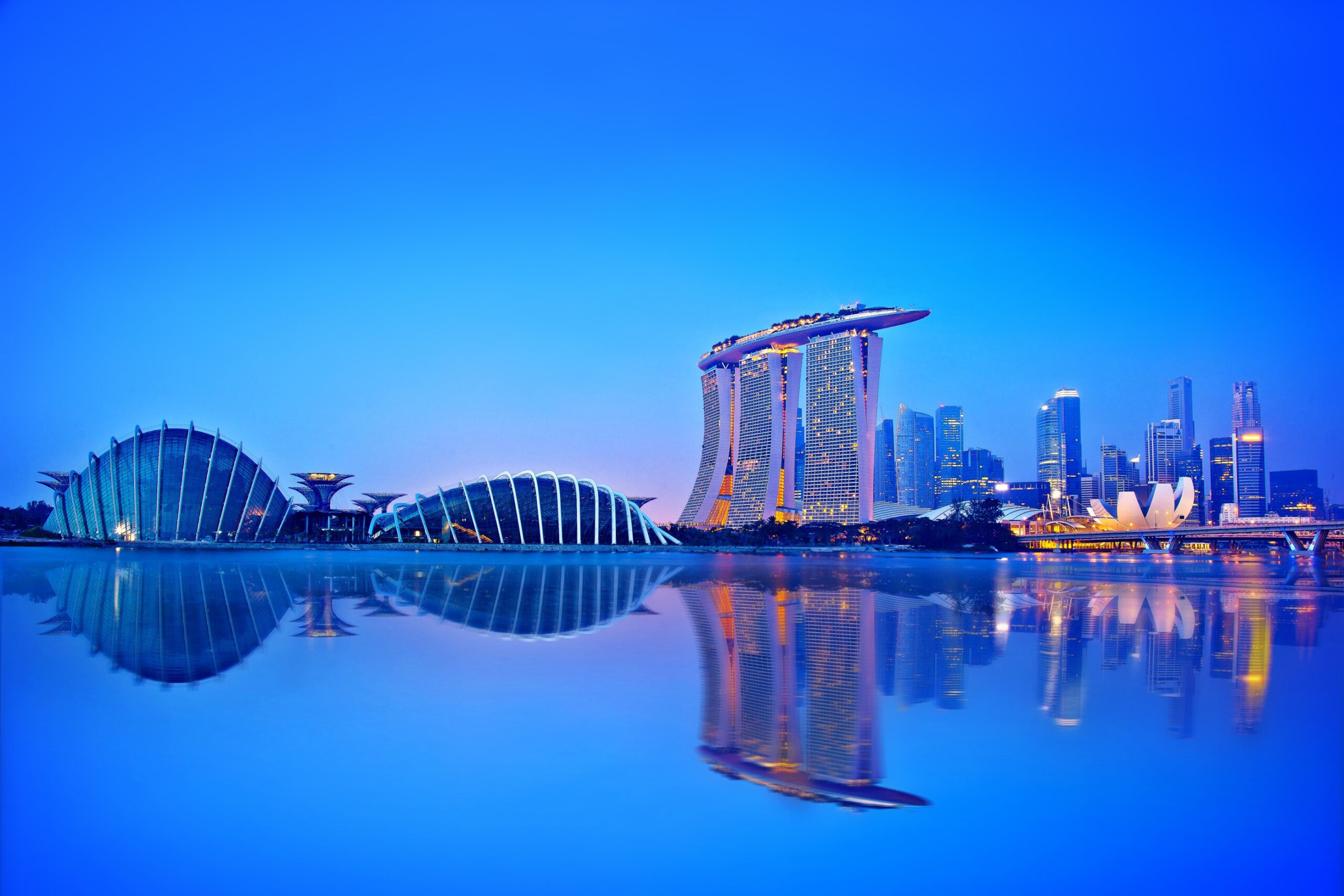 Gardens by the Bay during the "blue hour," just before sunrise or sunset in Singapore. Here the hour lasts about 20 minutes./Getty Images