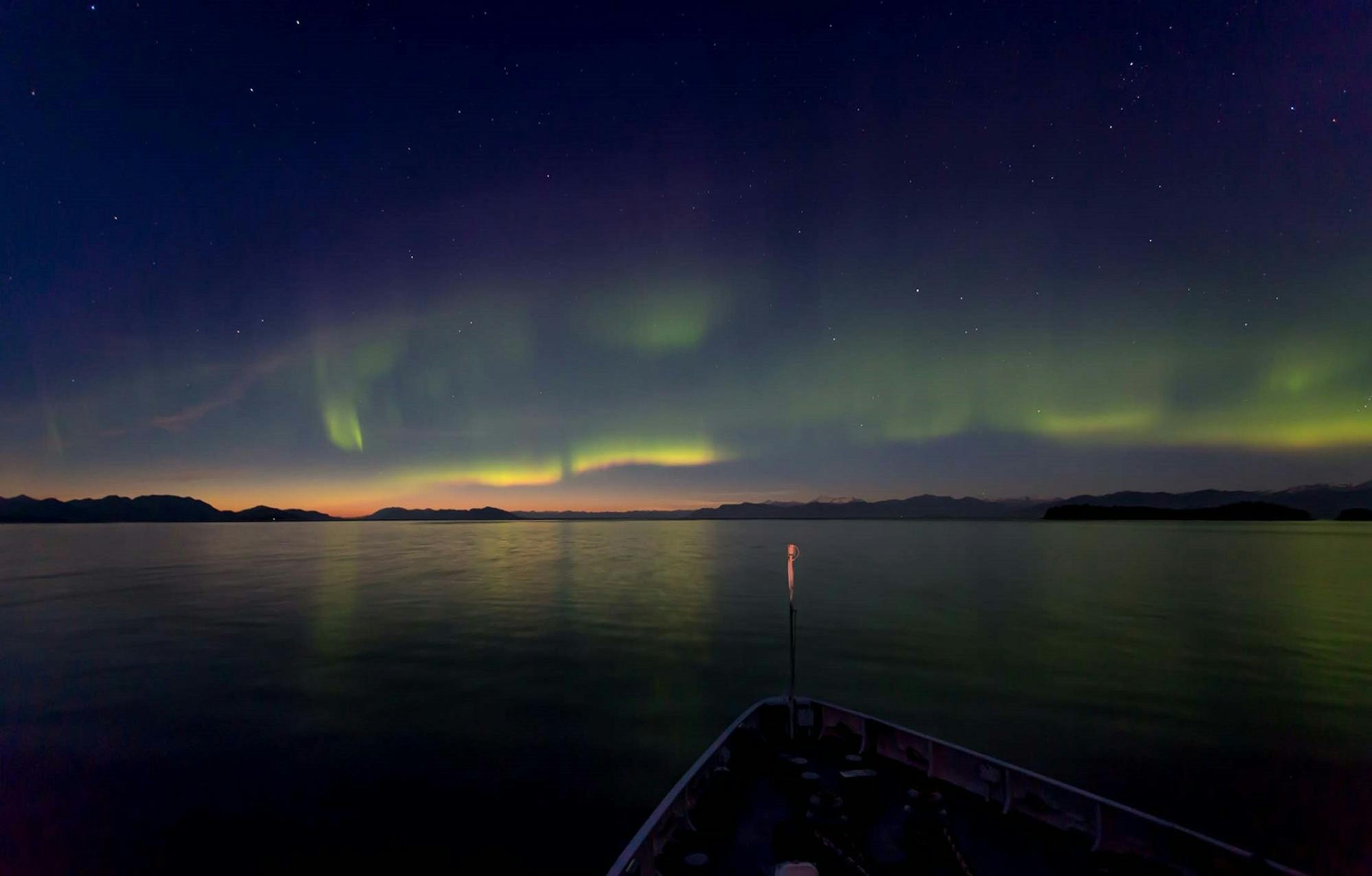 The aurora borealis lights up the northern skies, taken from Silver Explorer./Levi Biteng