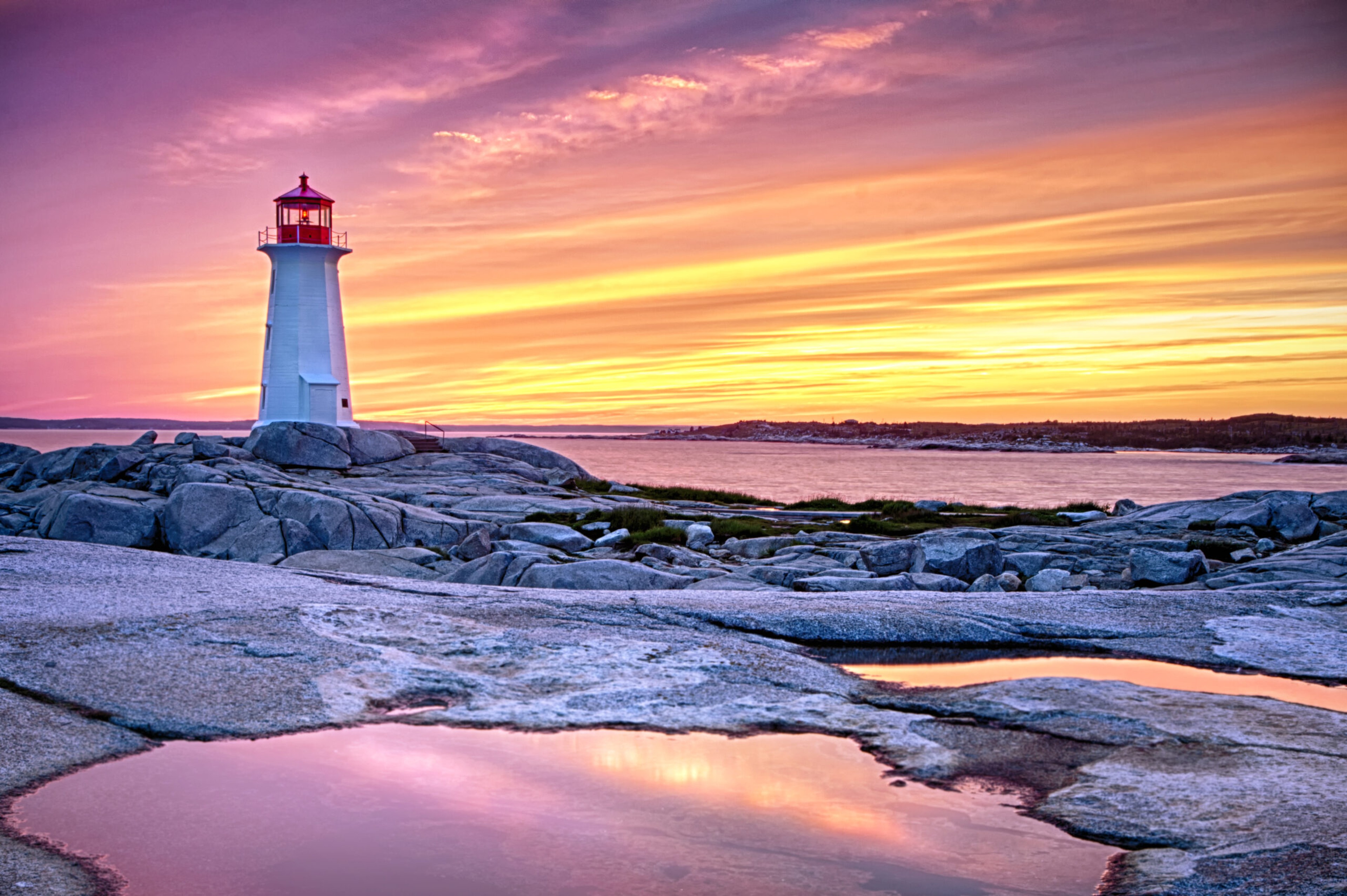 A nice light show at Peggy's Cove on an August evening/Getty Images