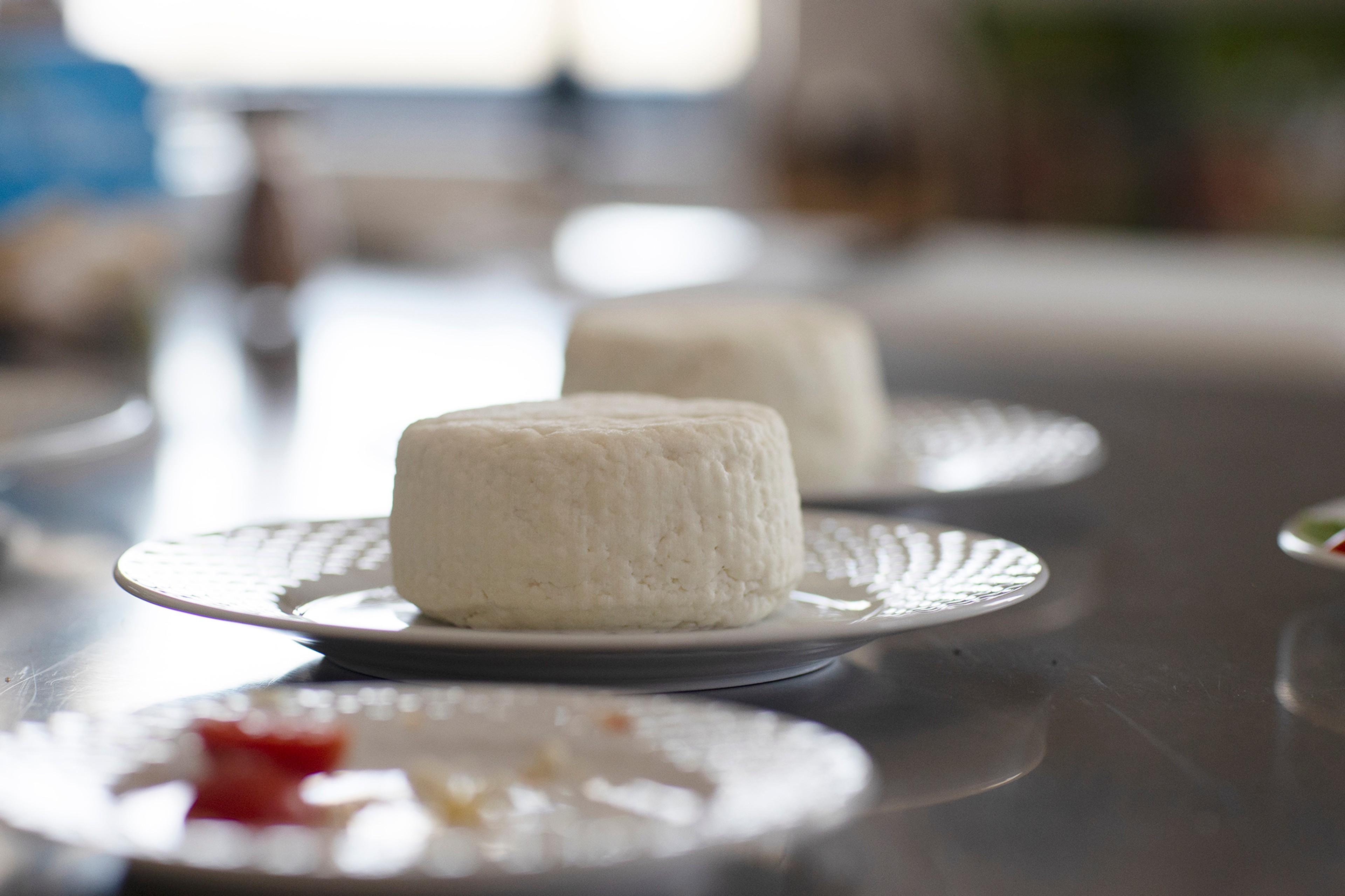 With George's guidance, we make his mother's myzithra, a fast-cooking traditional cheese./Lucia Griggi