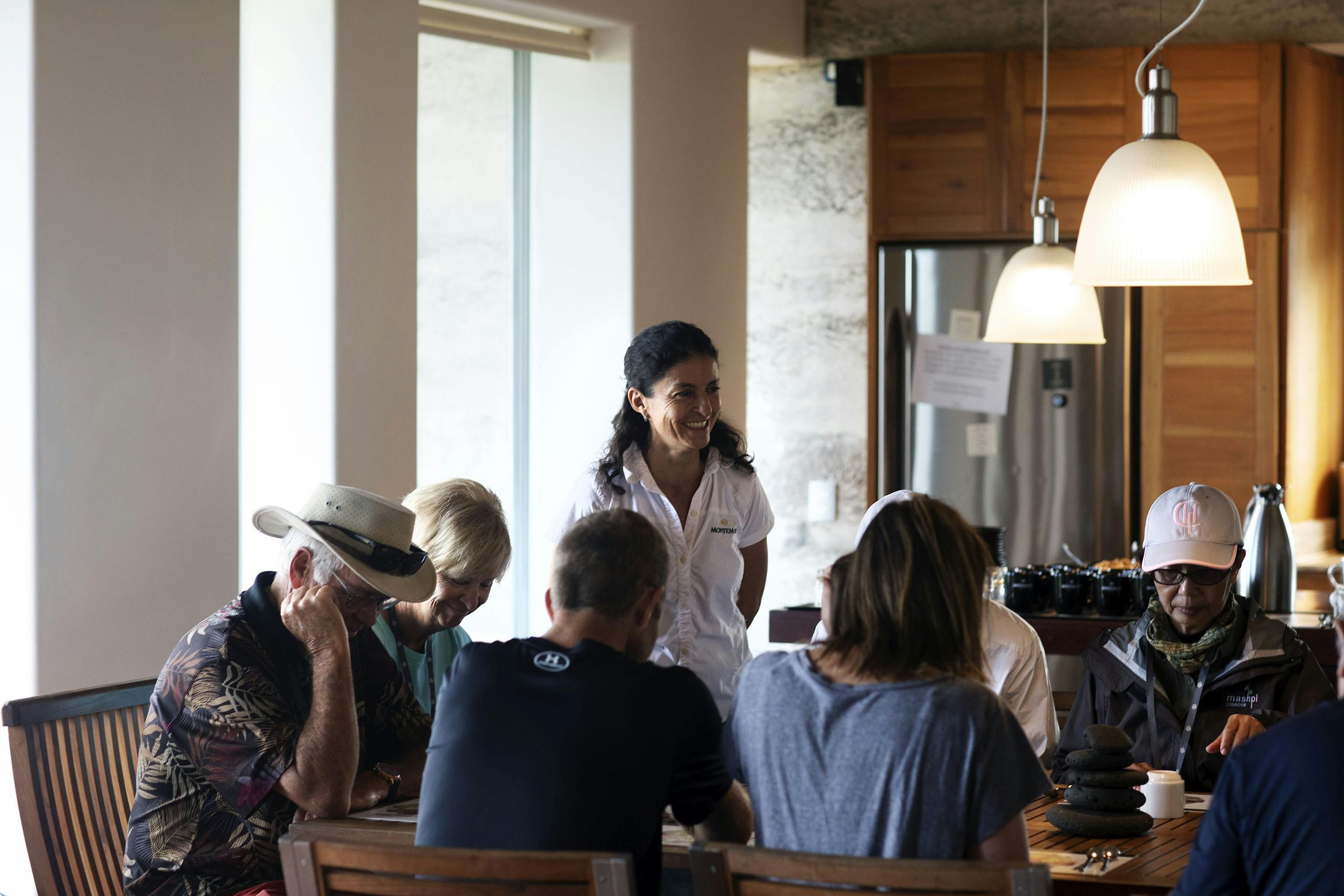 Reyna Oleas hosts Silversea guests at MonteMar coffee farm in Santa Cruz, Galapagos./Lucia Griggi