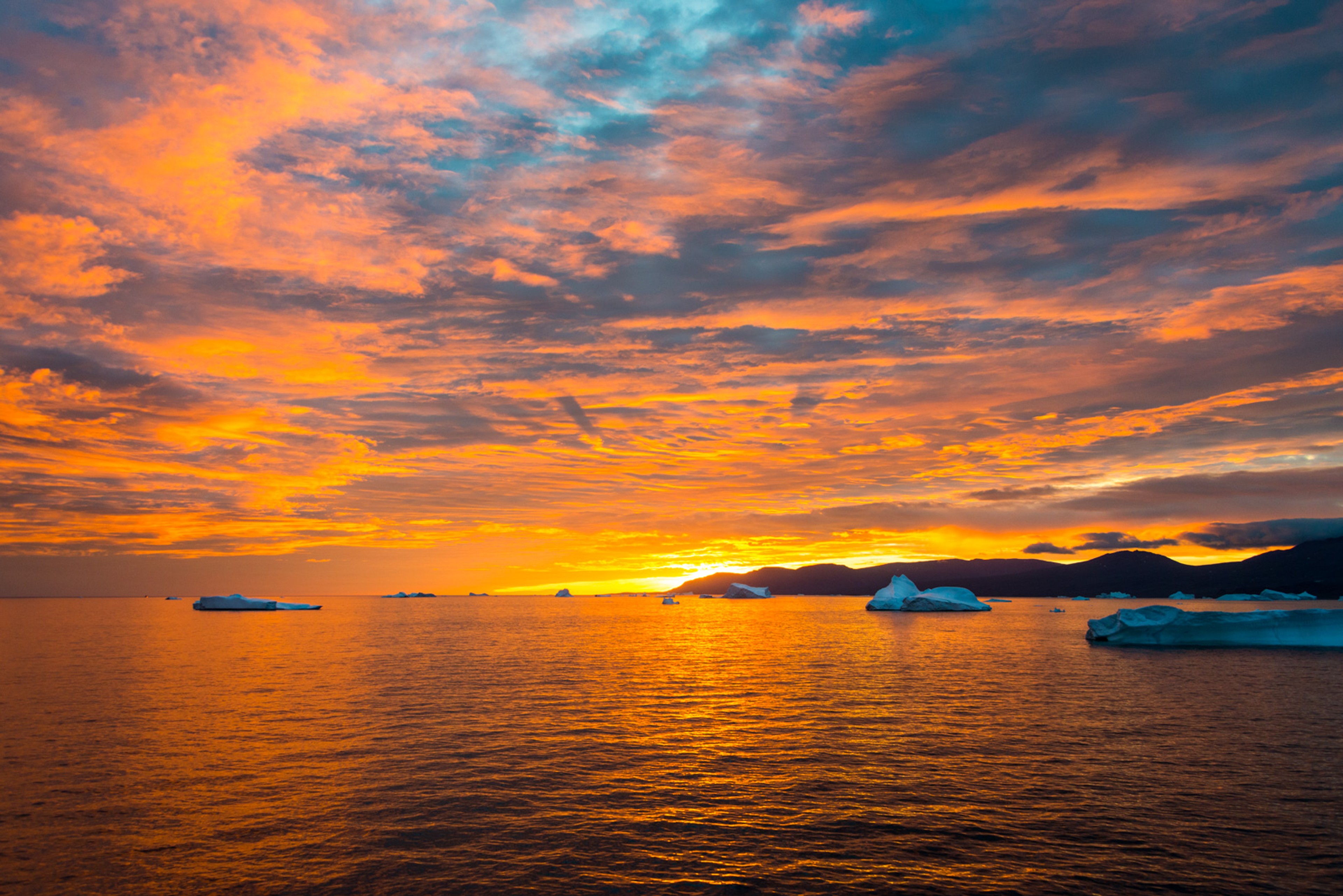Midnight sunset along Nuussuaq Peninsula, near Ilulissat, Greenland/Photo by David Swanson for Silversea