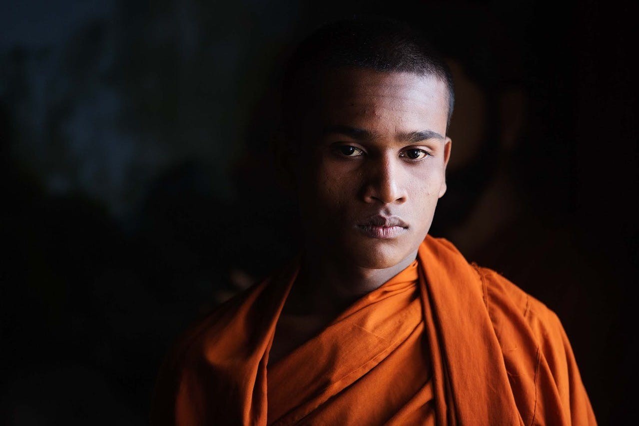 A monk willingly stands for a photograph in Kandy, Sri Lanka./Lucia Griggi
