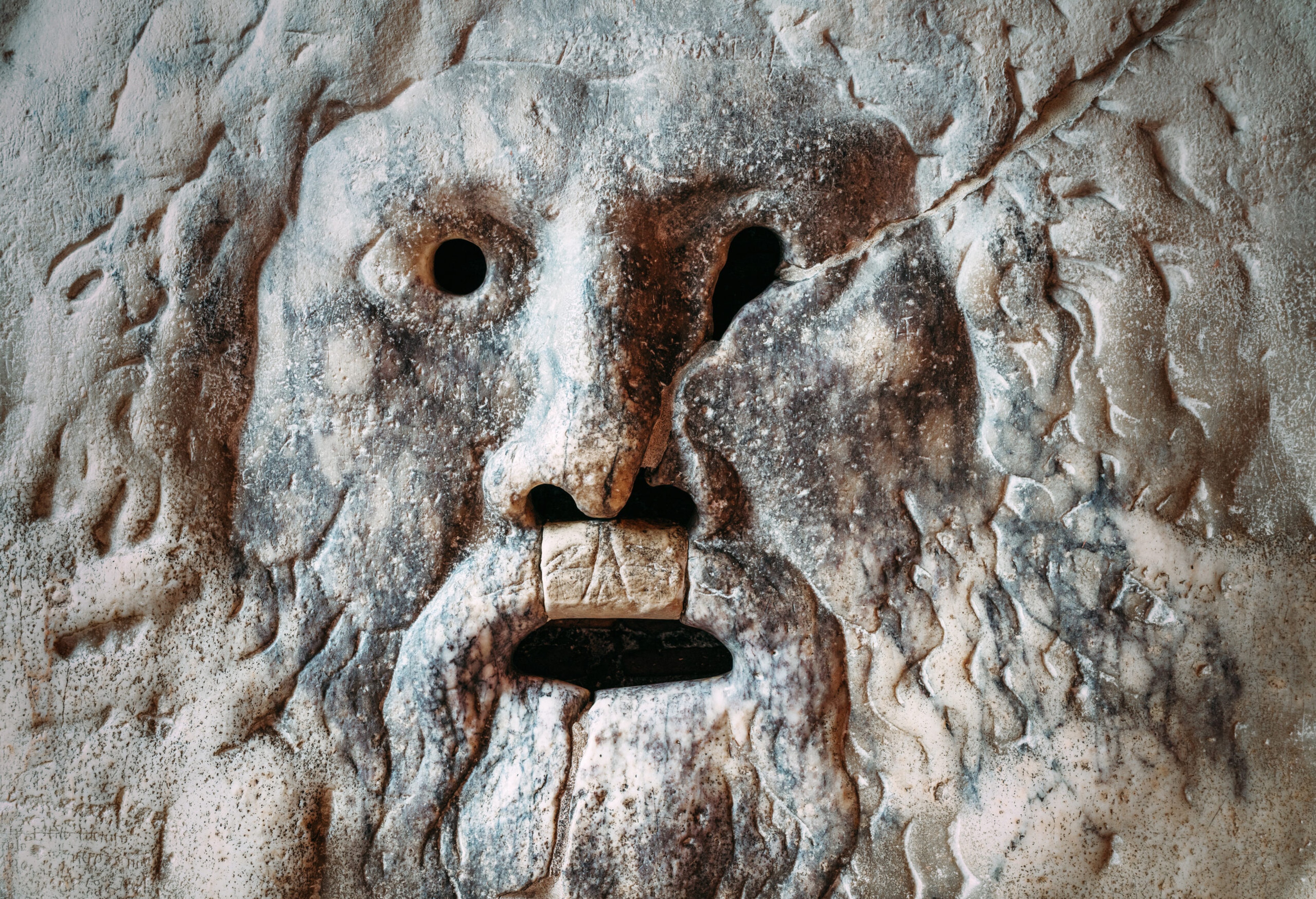Mouth of Truth ( Bocca della Verità) marble mask in the Santa Maria in Cosmedin basilica in Rome./Getty Images