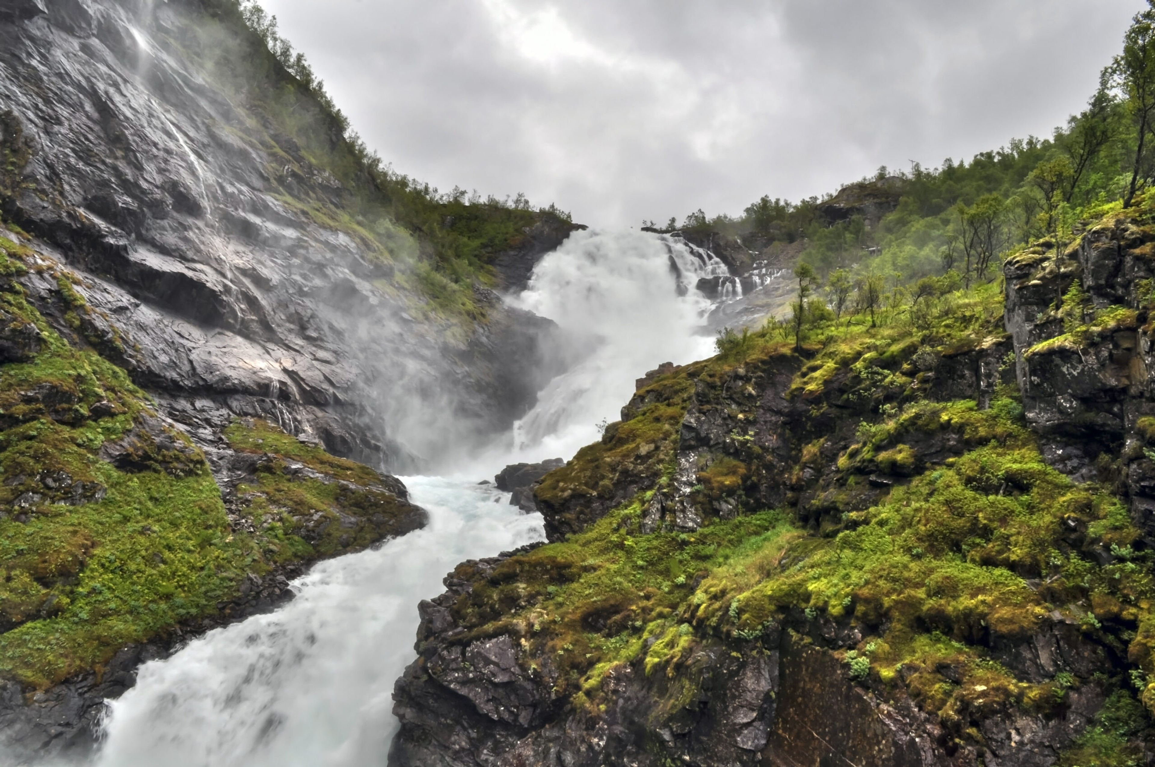 Kjosfoss waterfall along the Flåmsbana railway track in Norway/Getty Images