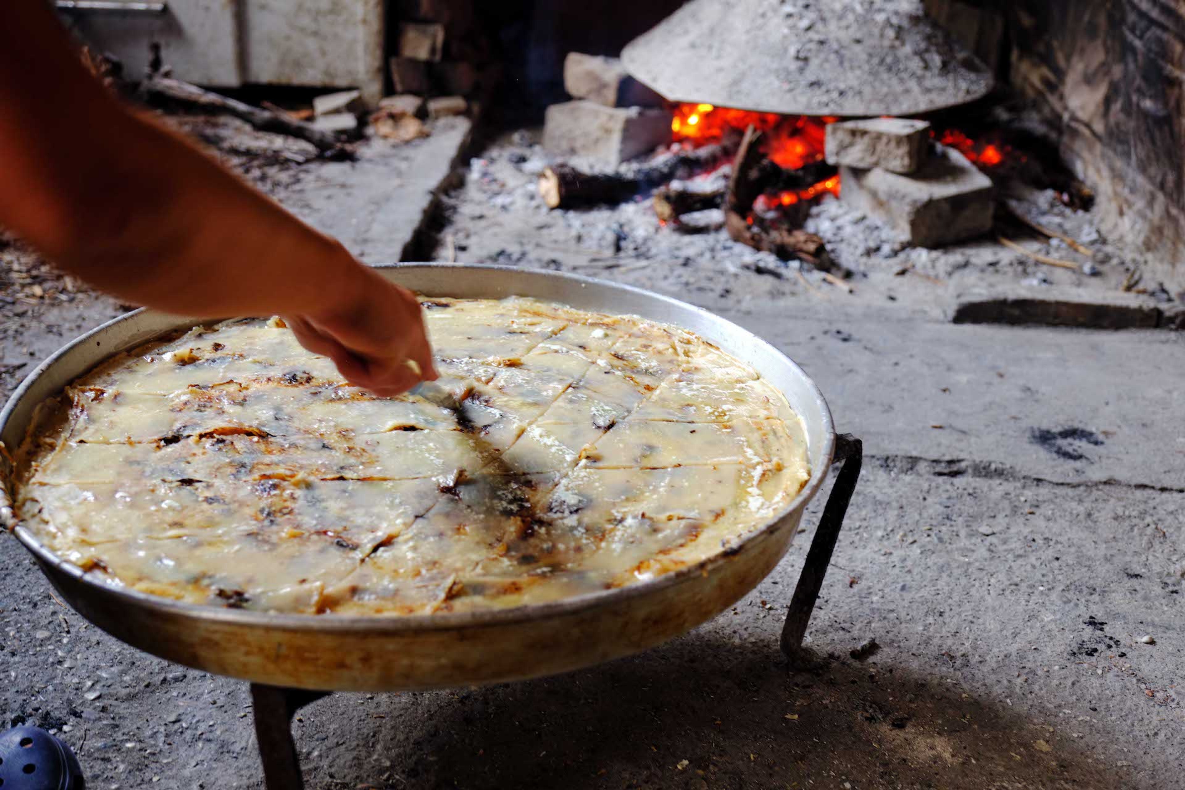 Flija, a layered, savory cake of crêpes, is one of Albania's most emblematic dishes./RRNO Foundation