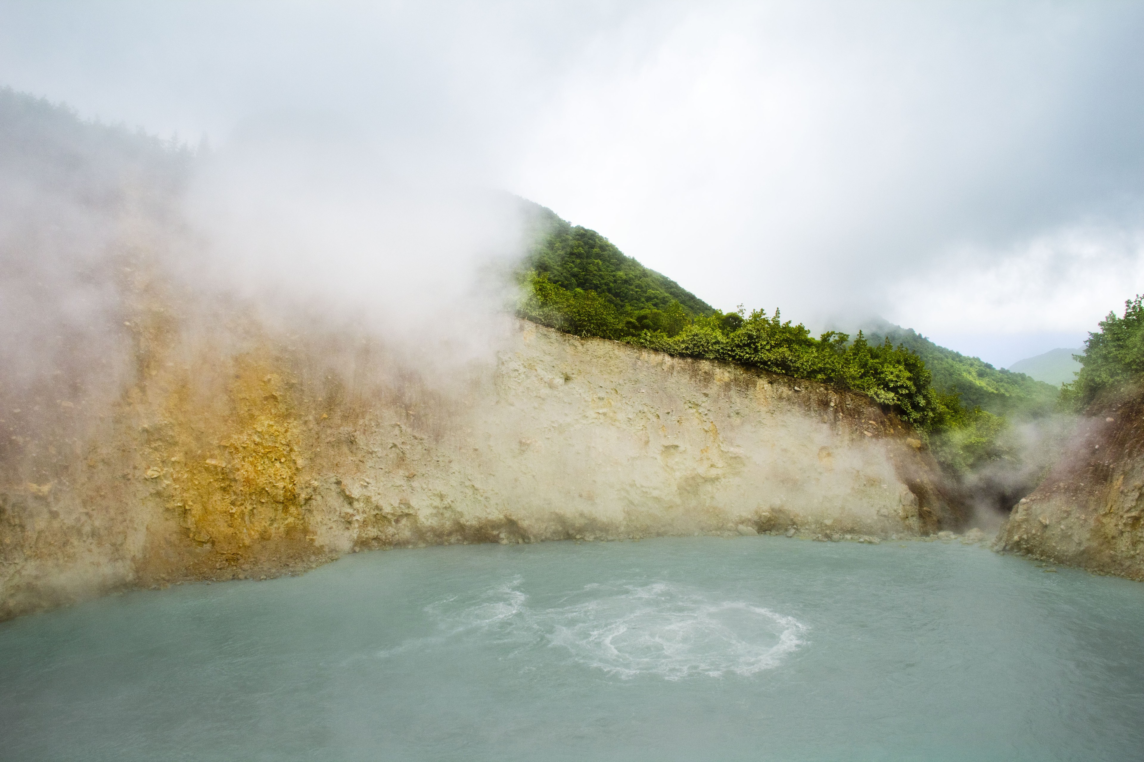 The Boiling Lake is a natural wonder in Dominica, the Caribbean. It is a volcano-hydrothermal flooded fumarole, located in the Morne Trois Pitons National Park. Photo/Shutterstock