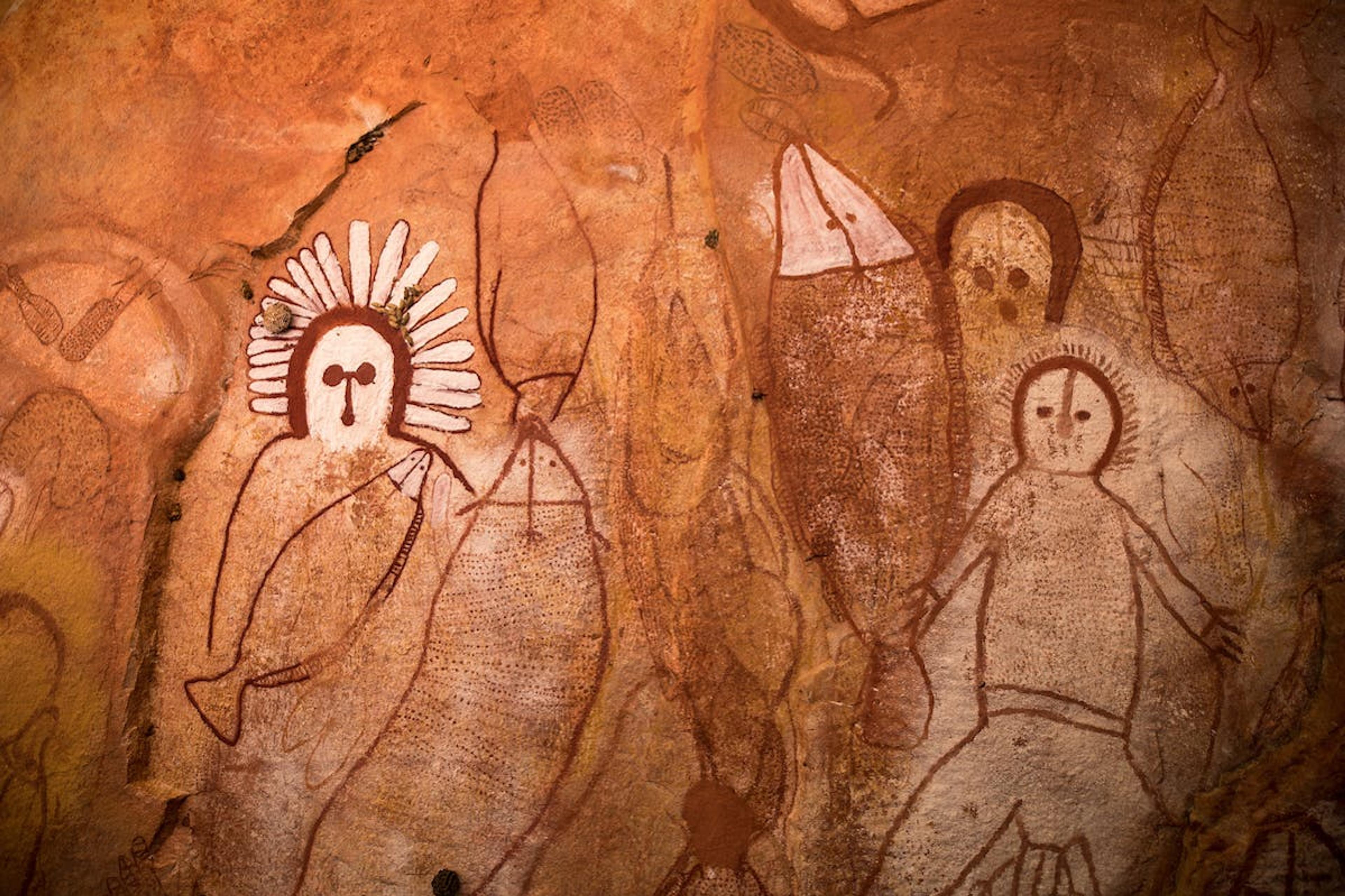 The large, wide-eyed Wandjinas are spirit figures drawn on thousands of cliffs and cave walls in the Kimberley./Bruno Cazarini