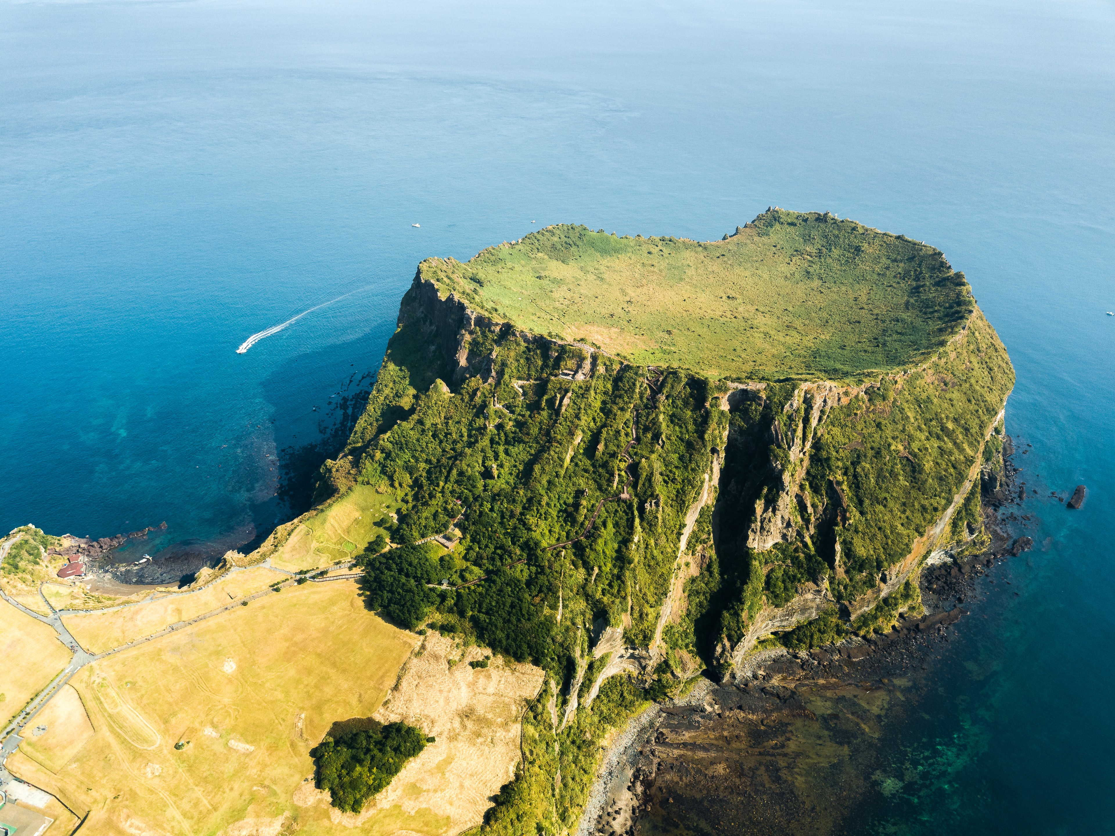 On Jeju, the Seongsan Ilchulbong Tuff Cone rises almost 600 feet above sea level, thanks to a magma flow almost 5,000 years ago./Getty Images