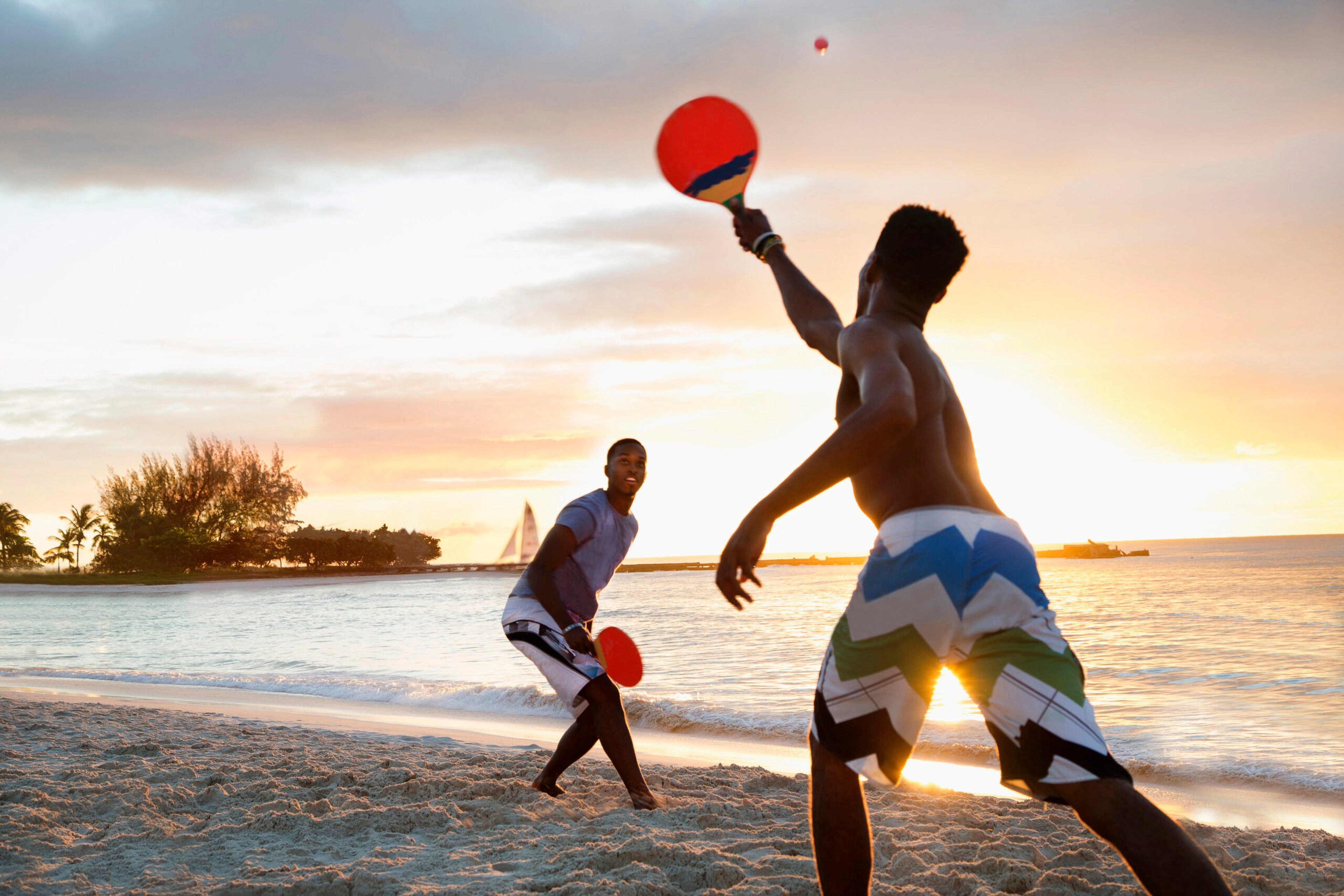 Playing beach tennis on the sandy shores of Barbados/Getty Images