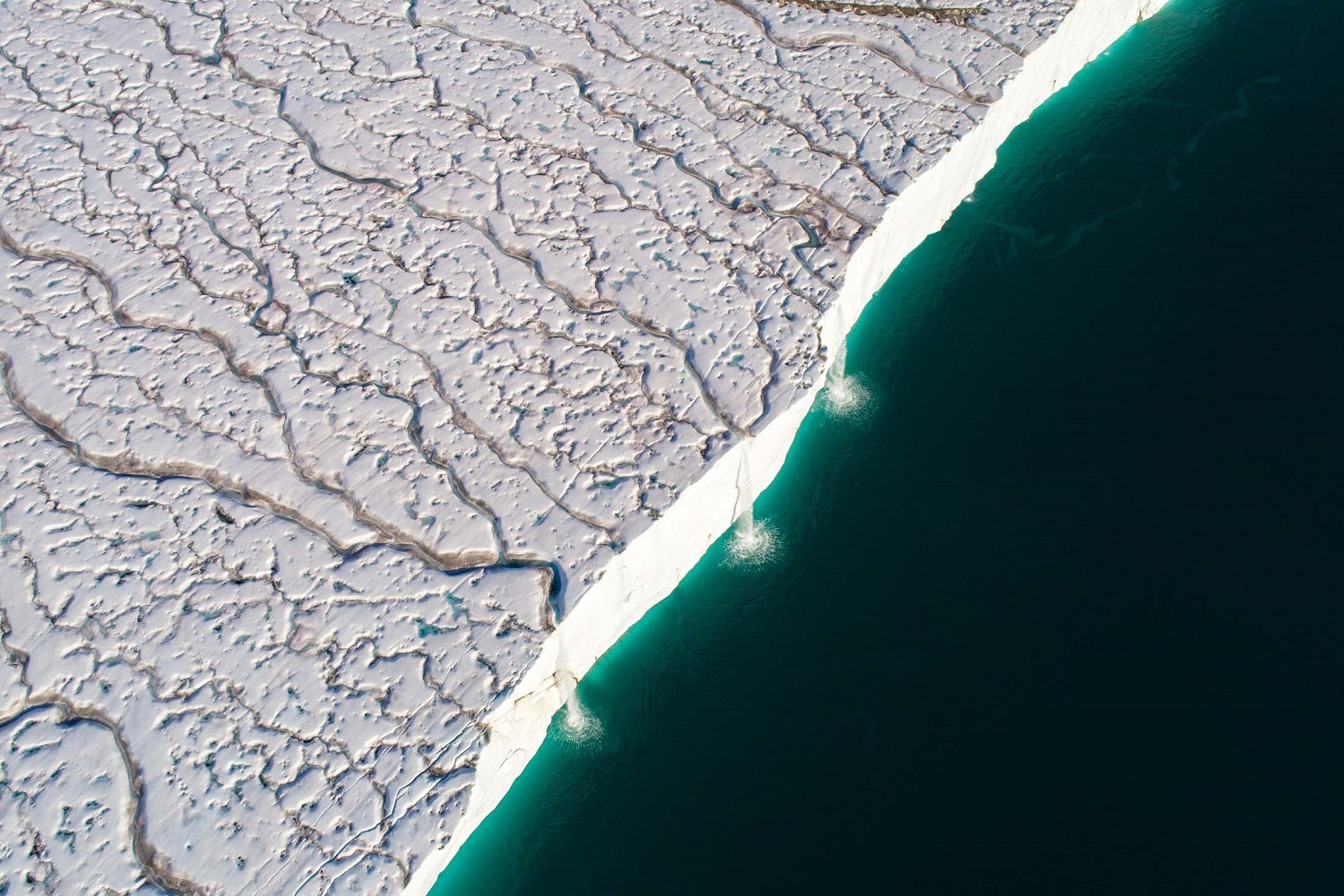 Elterman was determined to capture footage of the glacial runoffs from above, as they plummet into the Barents Sea/Denis Elterman