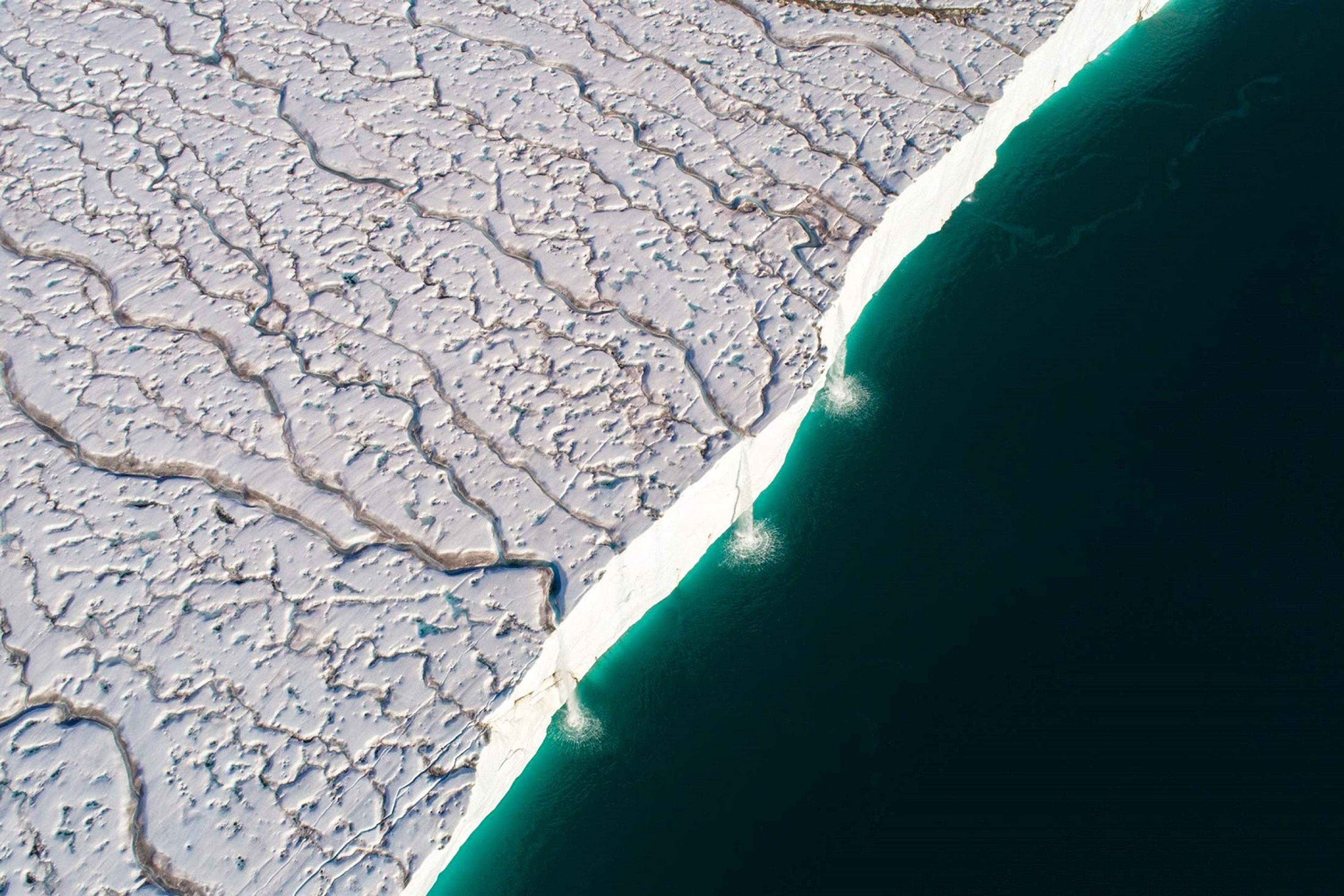 Elterman was determined to capture footage of the glacial runoffs from above, as they plummet into the Barents Sea/Denis Elterman