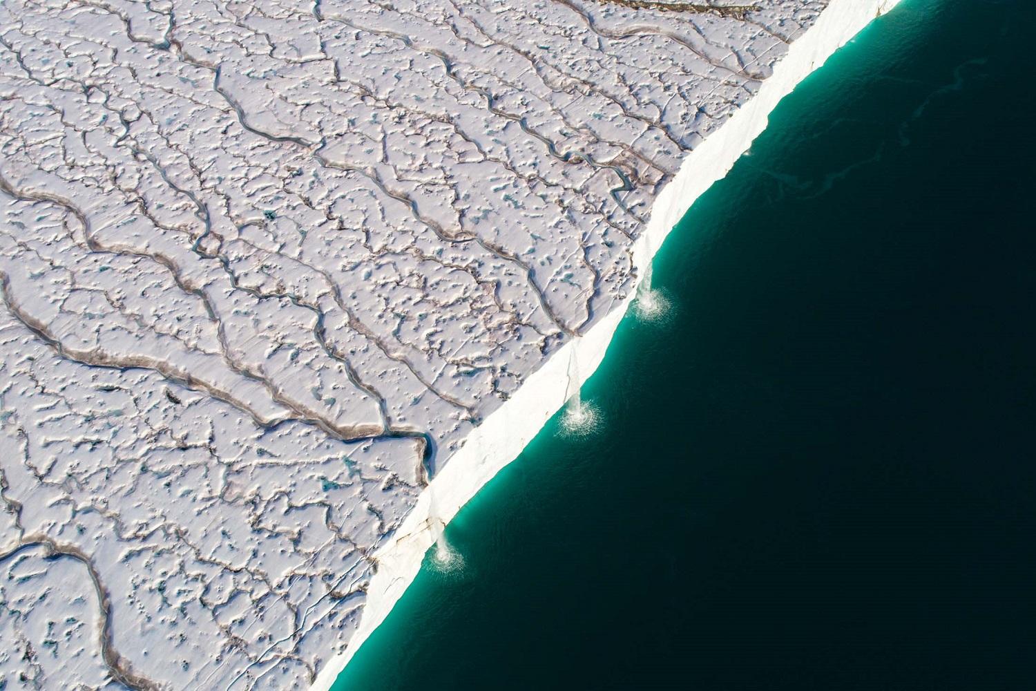 Elterman was determined to capture footage of the glacial runoffs from above, as they plummet into the Barents Sea/Denis Elterman