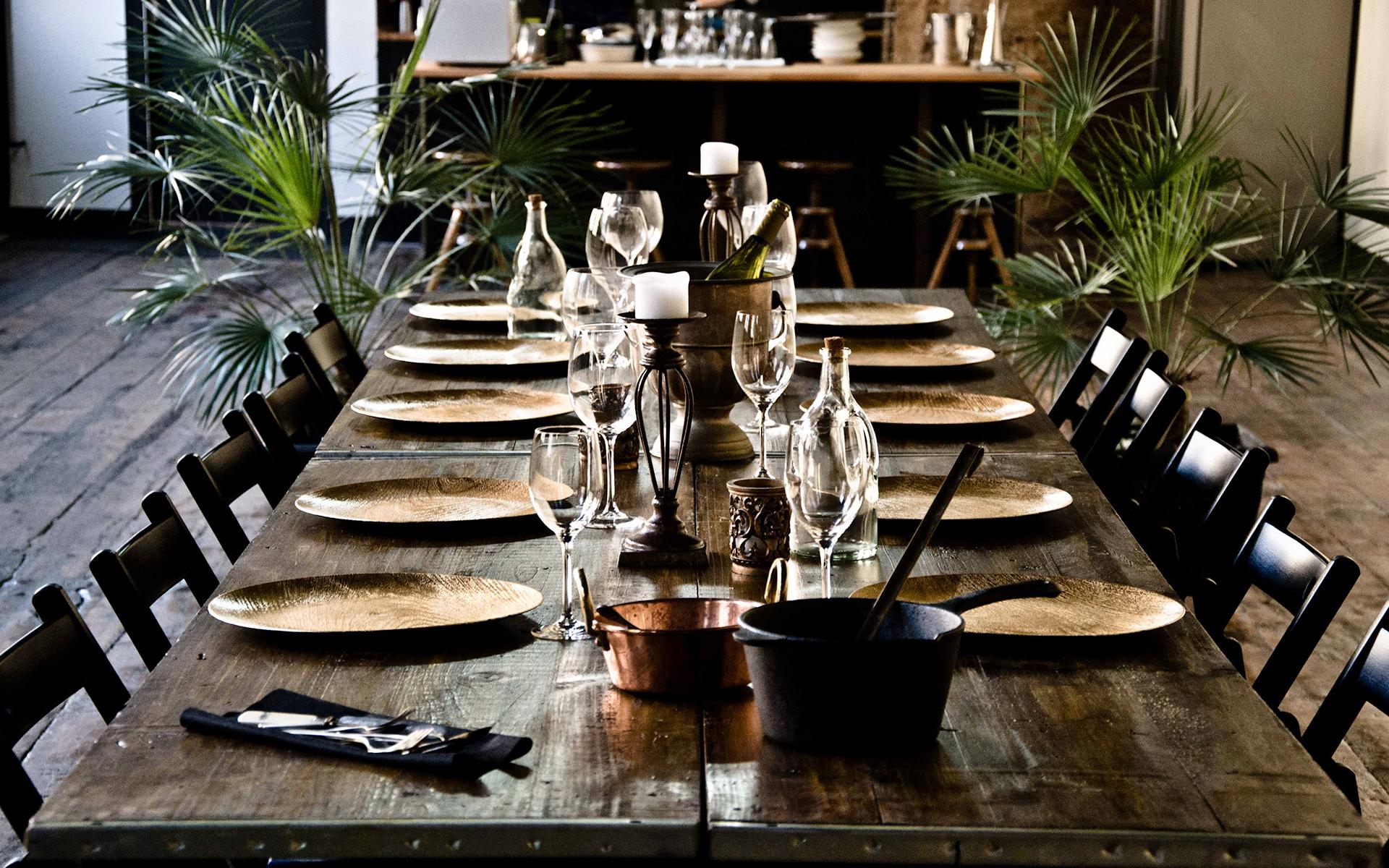 The table is set in Xavi's open kitchen, a 1,200-square-foot space housed in a former 19th century textile factory in the heart of Barcelona's Raval District./Xavi Morón.