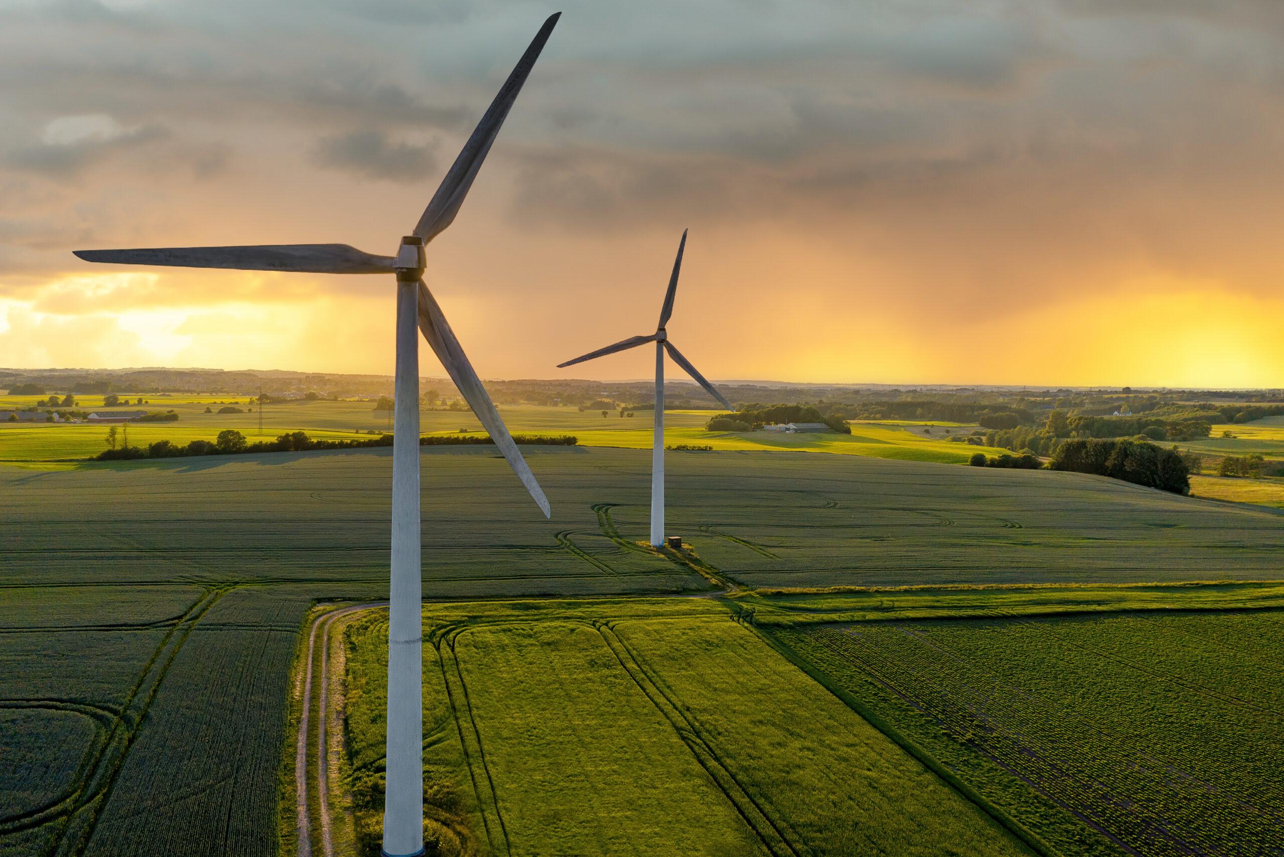 Wind turbines produce electricity in a field in Skanderborg, Denmark./Getty Images