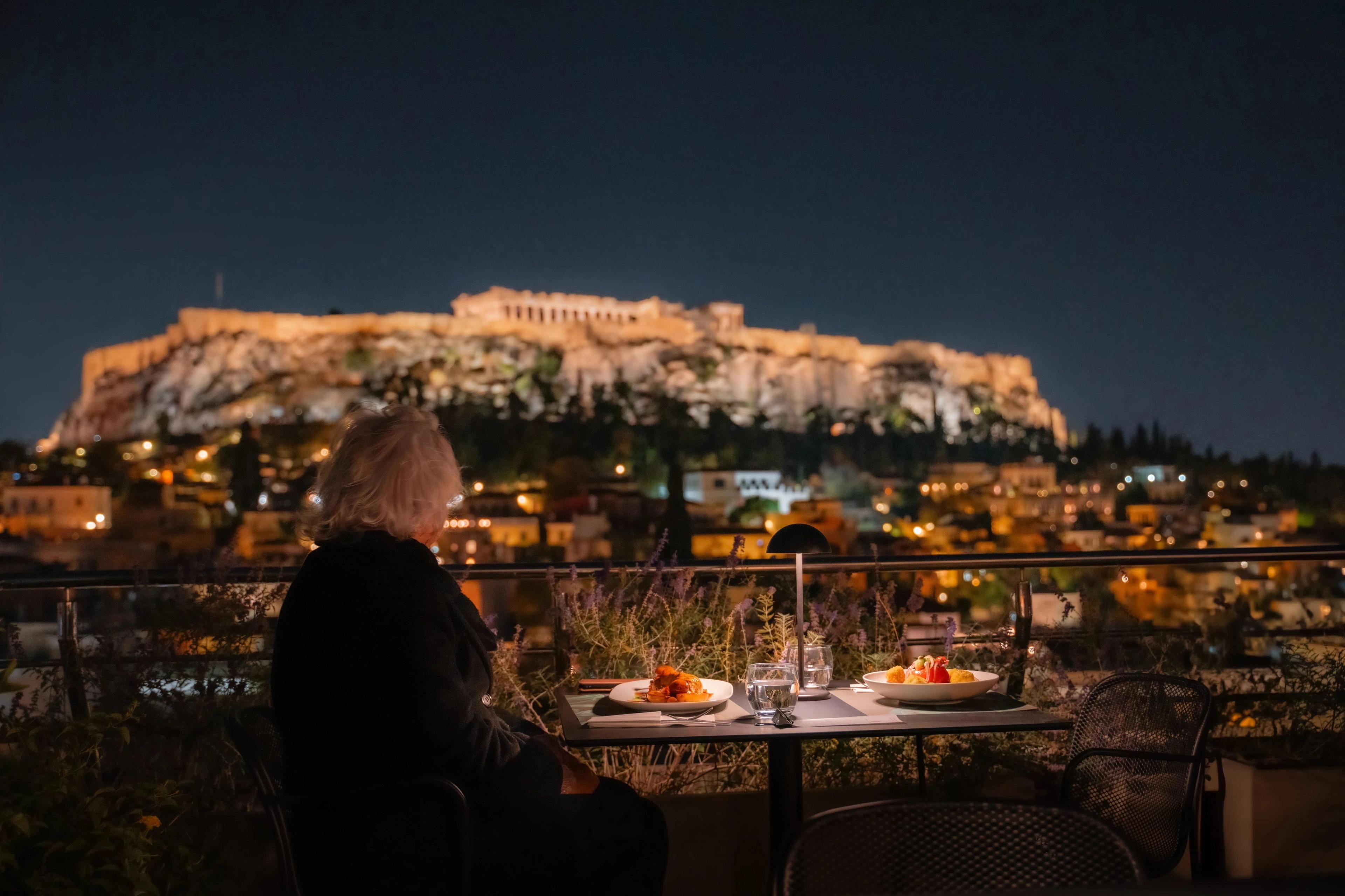 Dining at the Metropolis Roof Garden, located on the 10th floor of the luxury Electra Metropolis Hotel in Athens, Greece.