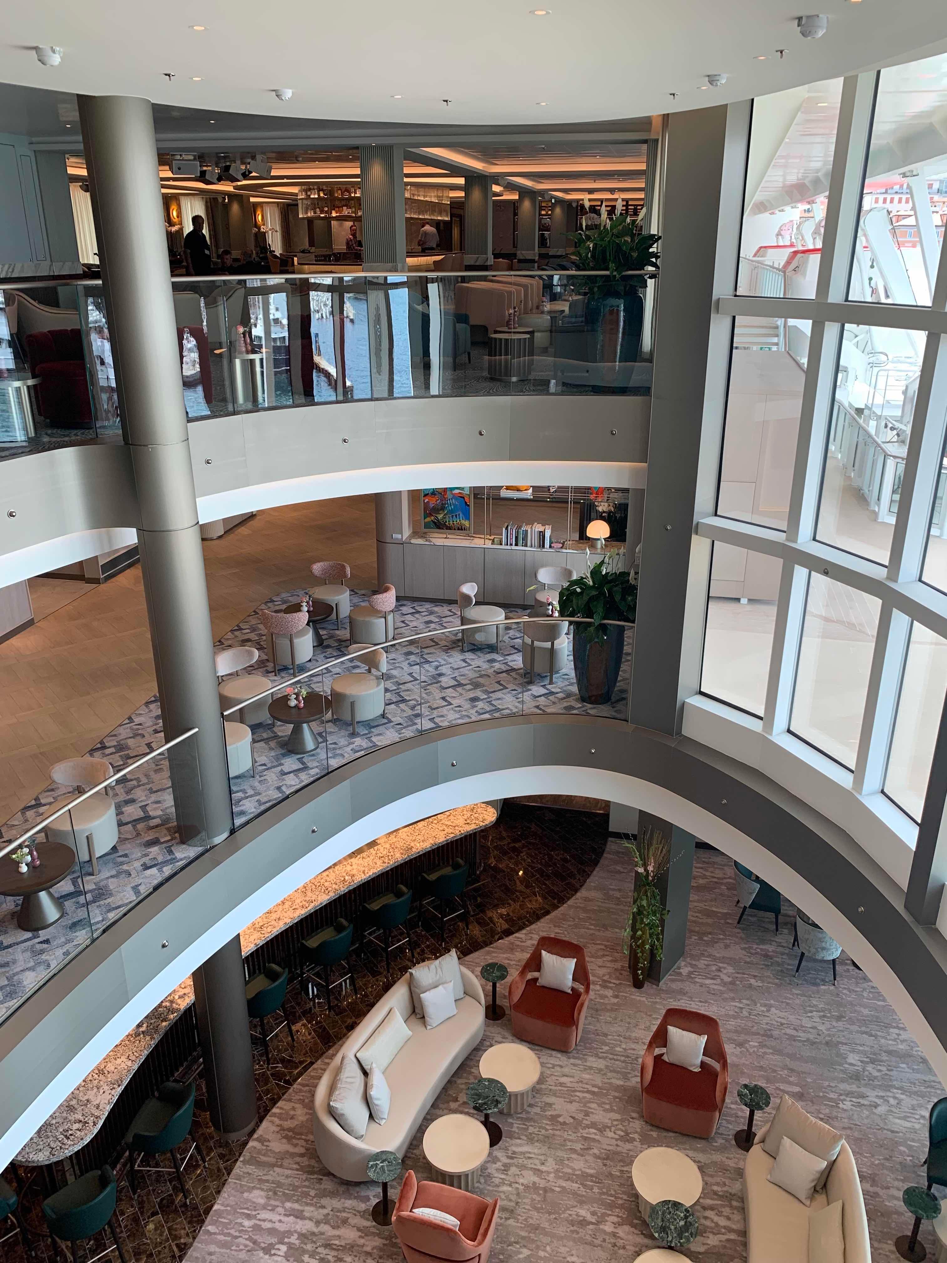 The atrium on Silver Nova is a great spot for people watching. /Photo by Teijo Niemela for Silversea