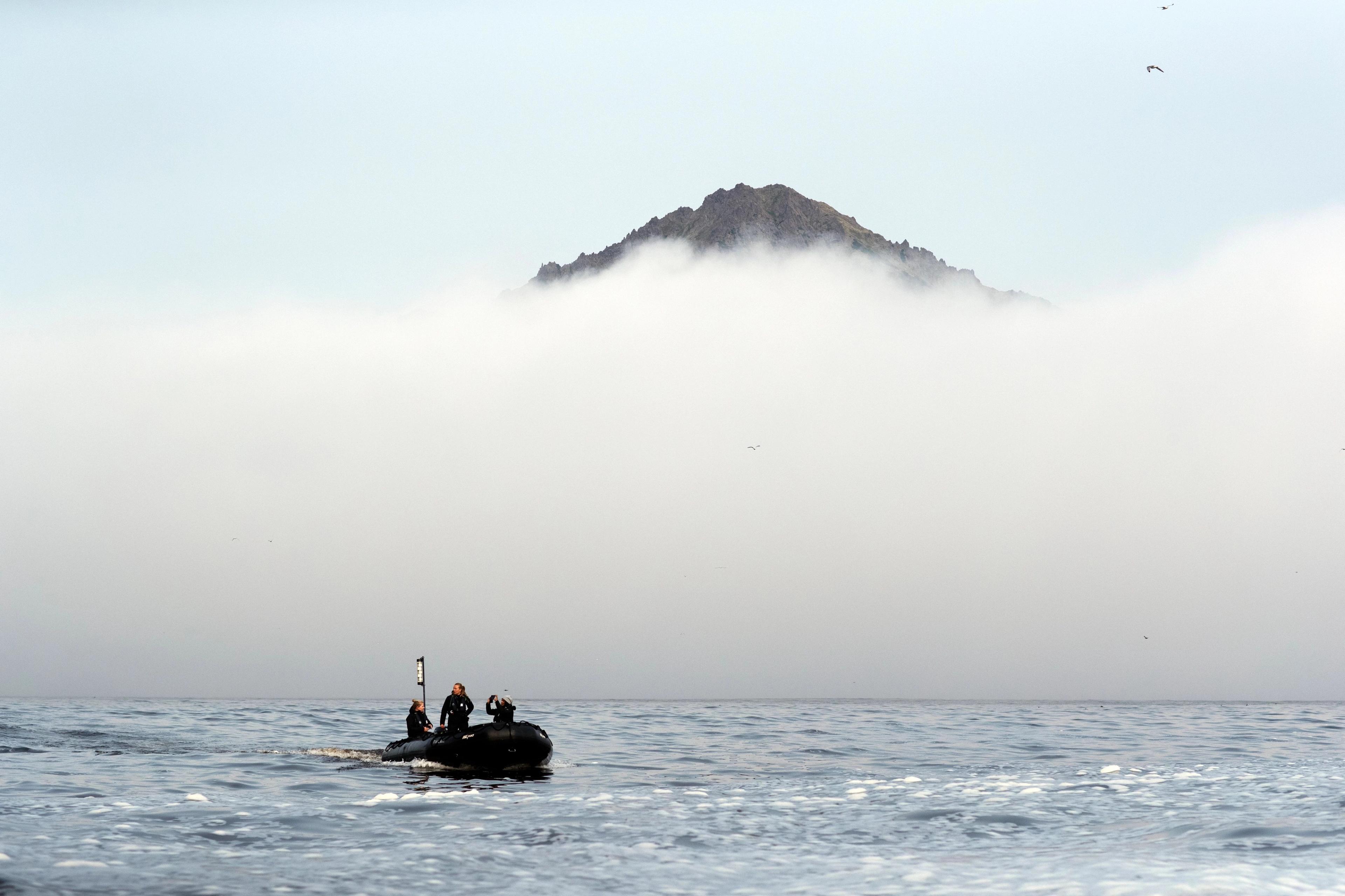 Navigating Alaskan coastal waters like Bogoslof Island in a Zodiac is a classic experience.