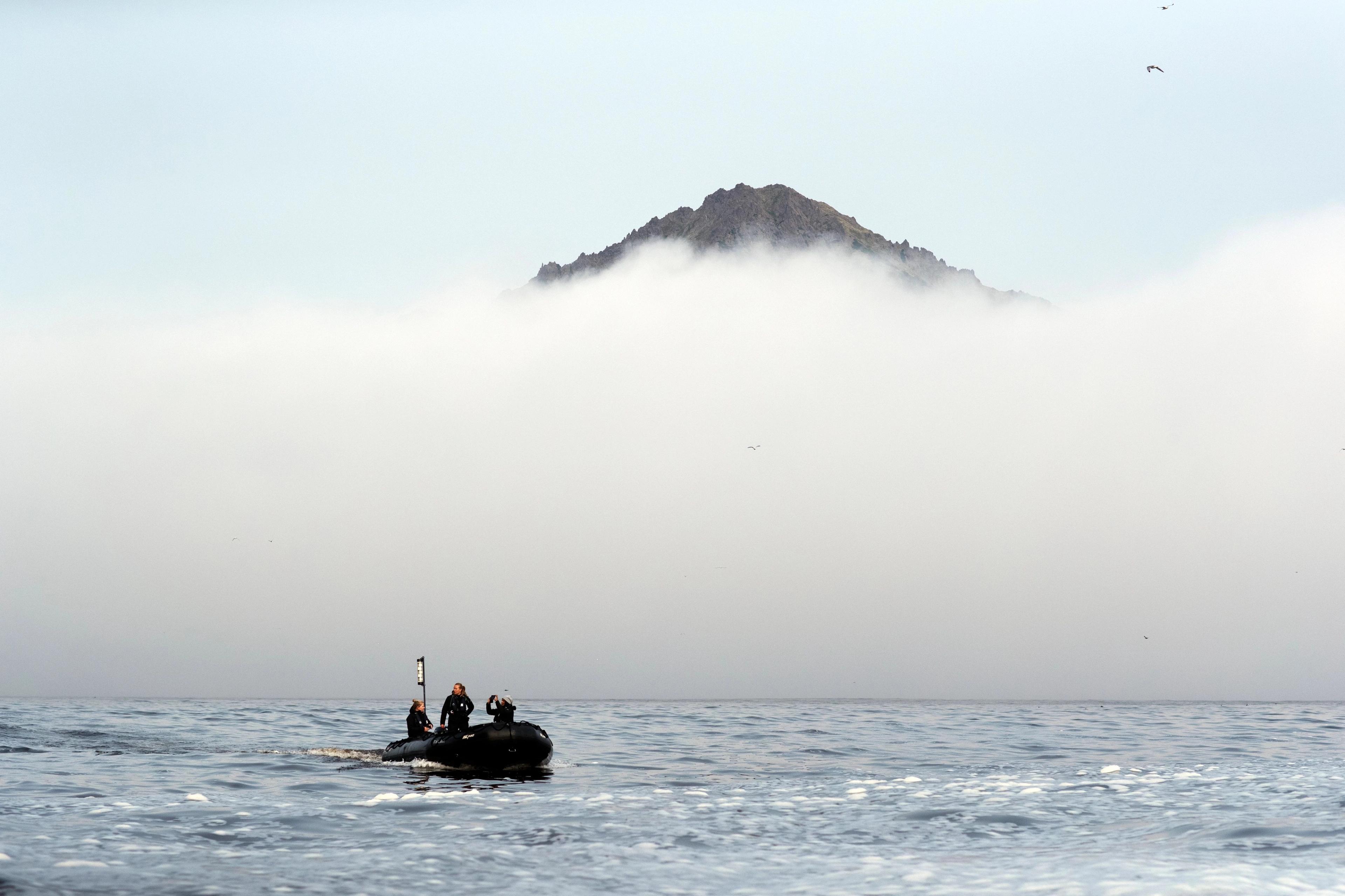 Navigating Alaskan coastal waters like Bogoslof Island in a Zodiac is a classic experience.