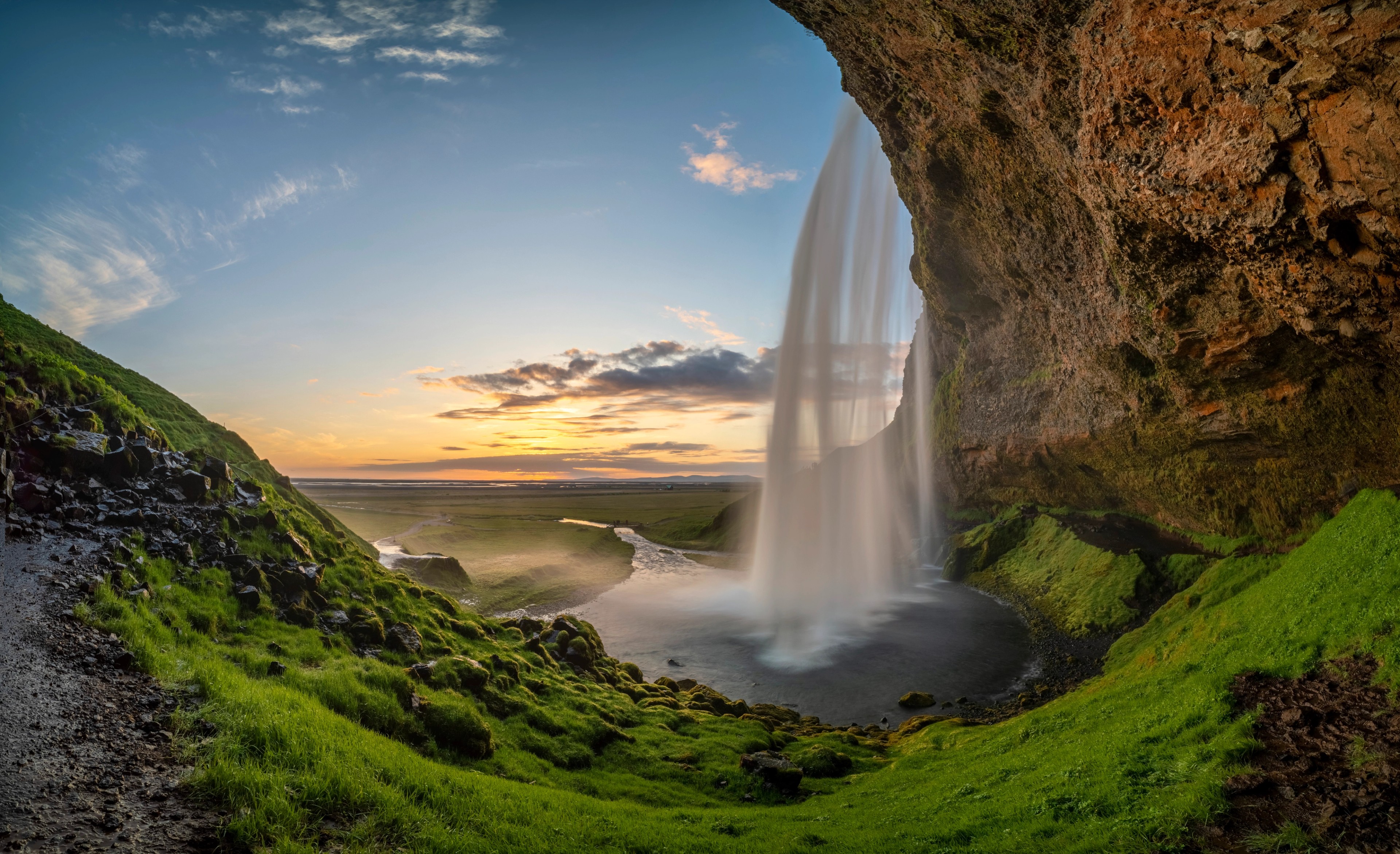 Seljalandsfoss waterfall, about 80 miles from Reykjavik, Iceland's capital. The waterfall drops almost 200 feet into the plunge pool./Getty Images