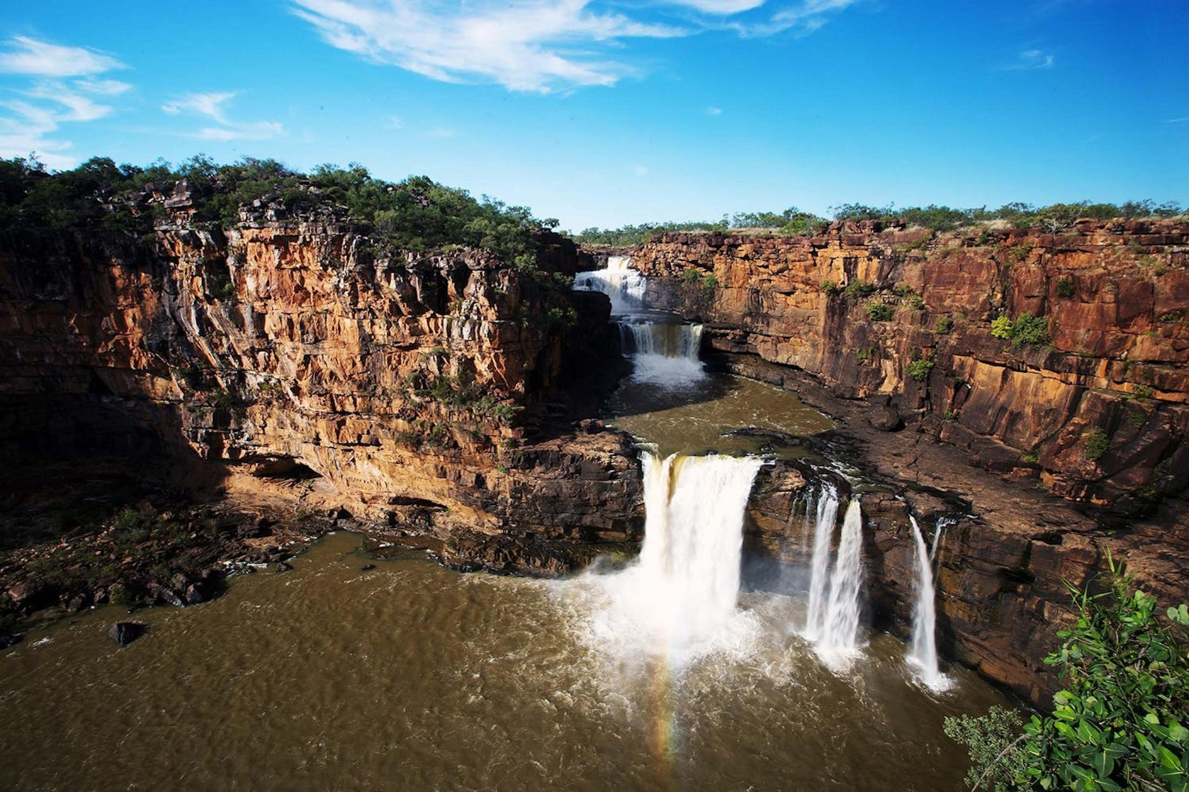 Vast waterfalls in the Kimberley region tumble over unusual rock formations that date back approximately two billion years./Denis Elterman