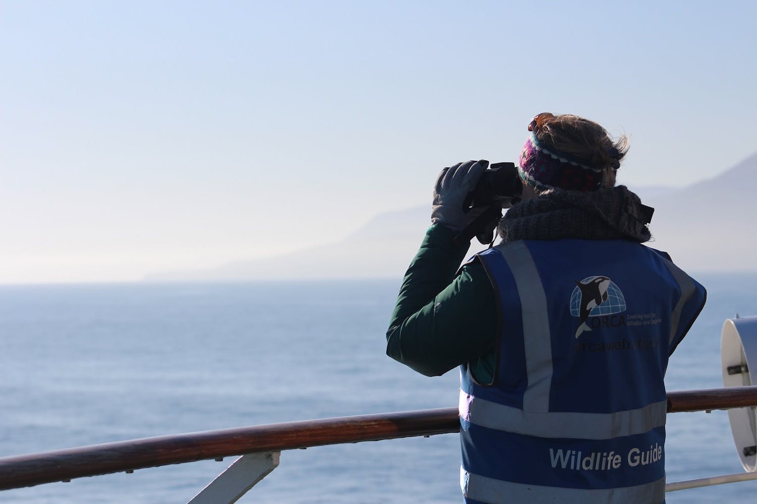 ORCA's Anna Bunney surveys the sea from a Silversea cruise ship./ORCA