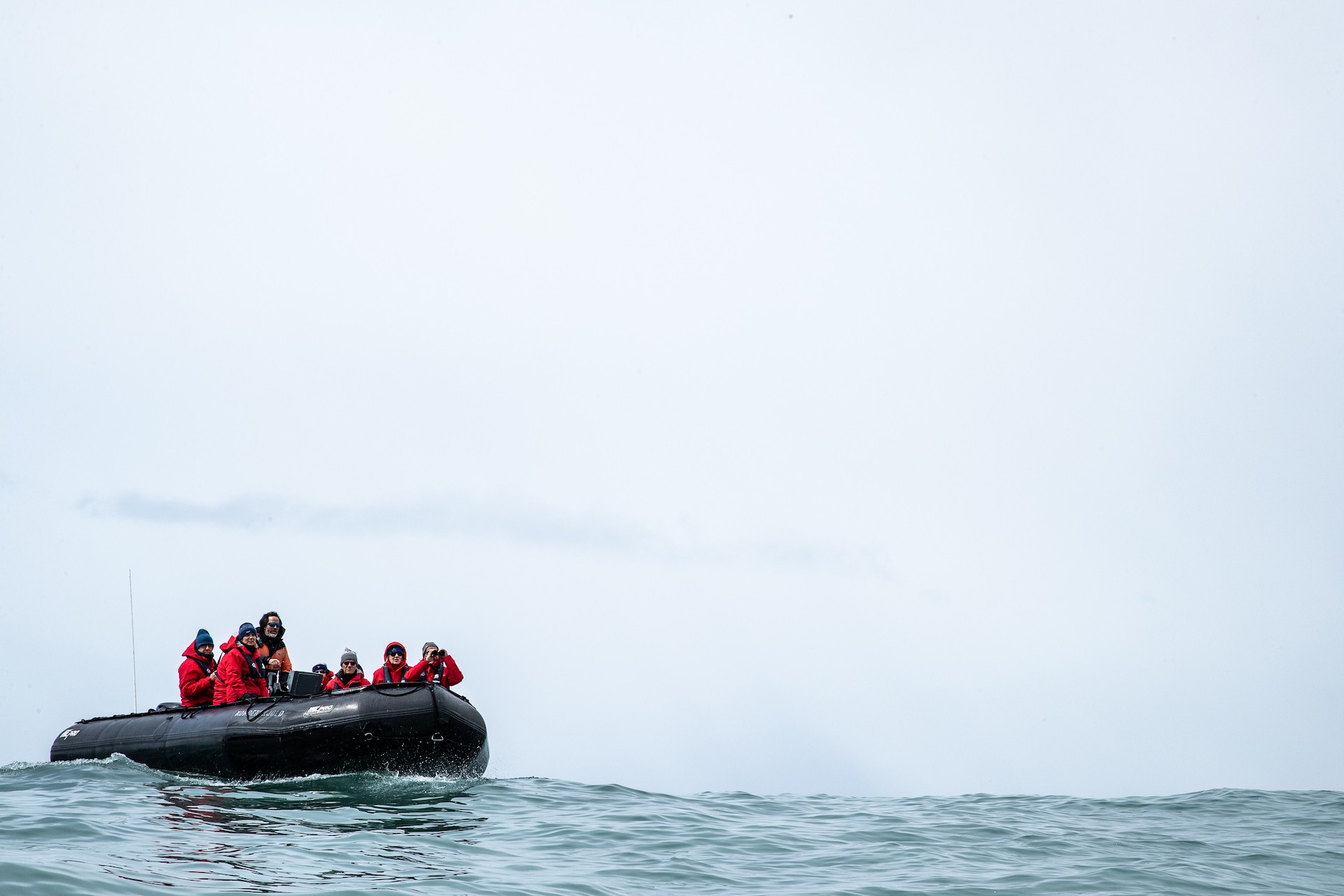 Silversea guests cruise to Gold Harbour onboard a Zodiac./Benn Berkeley