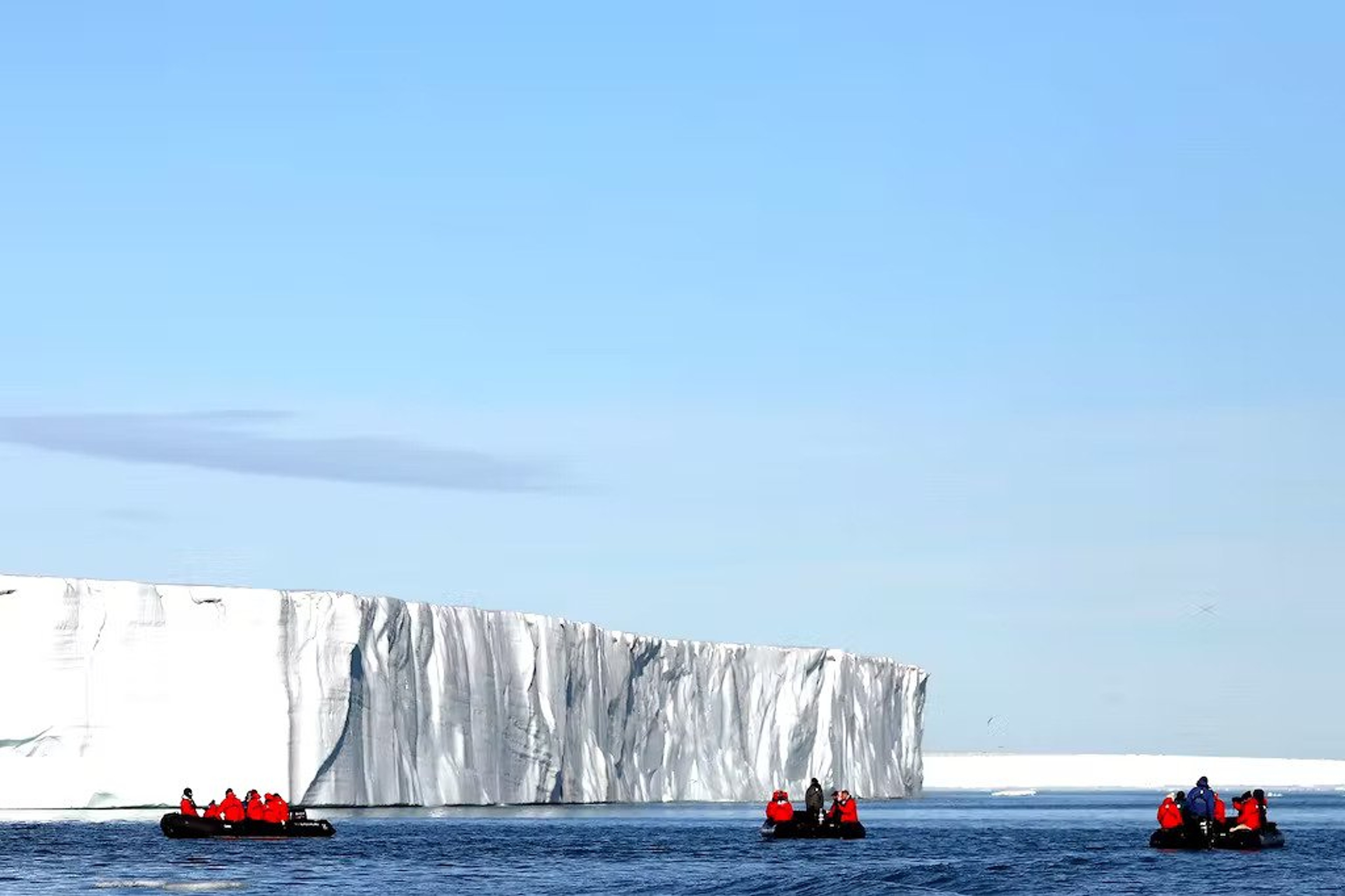 That chill in the air? It encourages couples to get closer on a Zodiac outing like this one in Svalbard in the Arctic./Silversea
