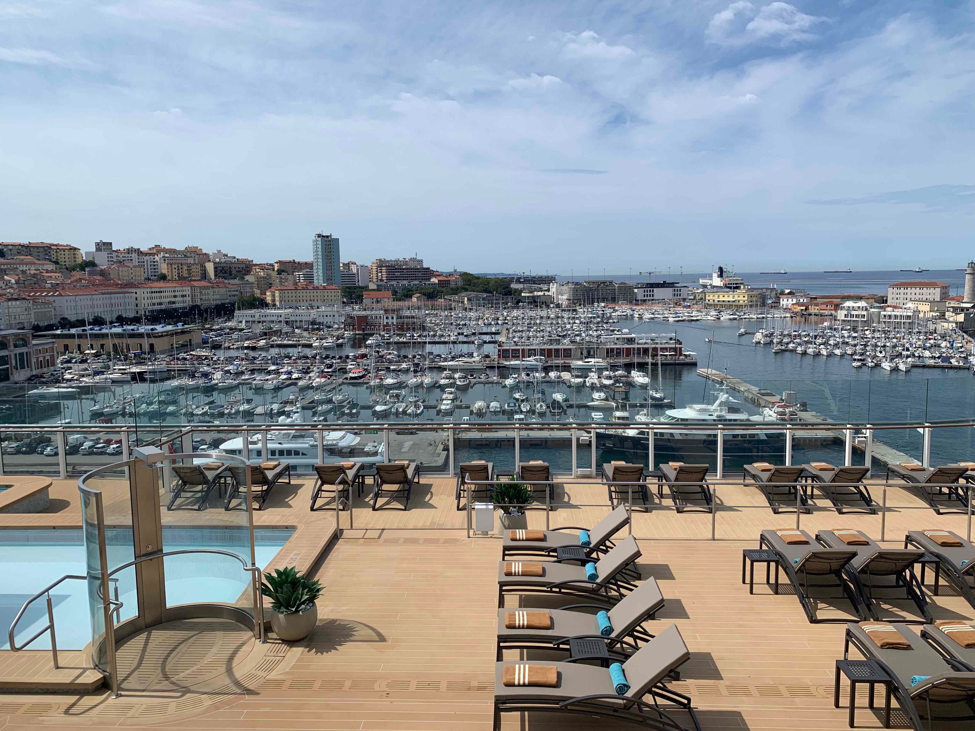 A look at the pool area on Silver Nova and its view of the Port of Trieste. Photo by Teijo Niemela for Silversea.