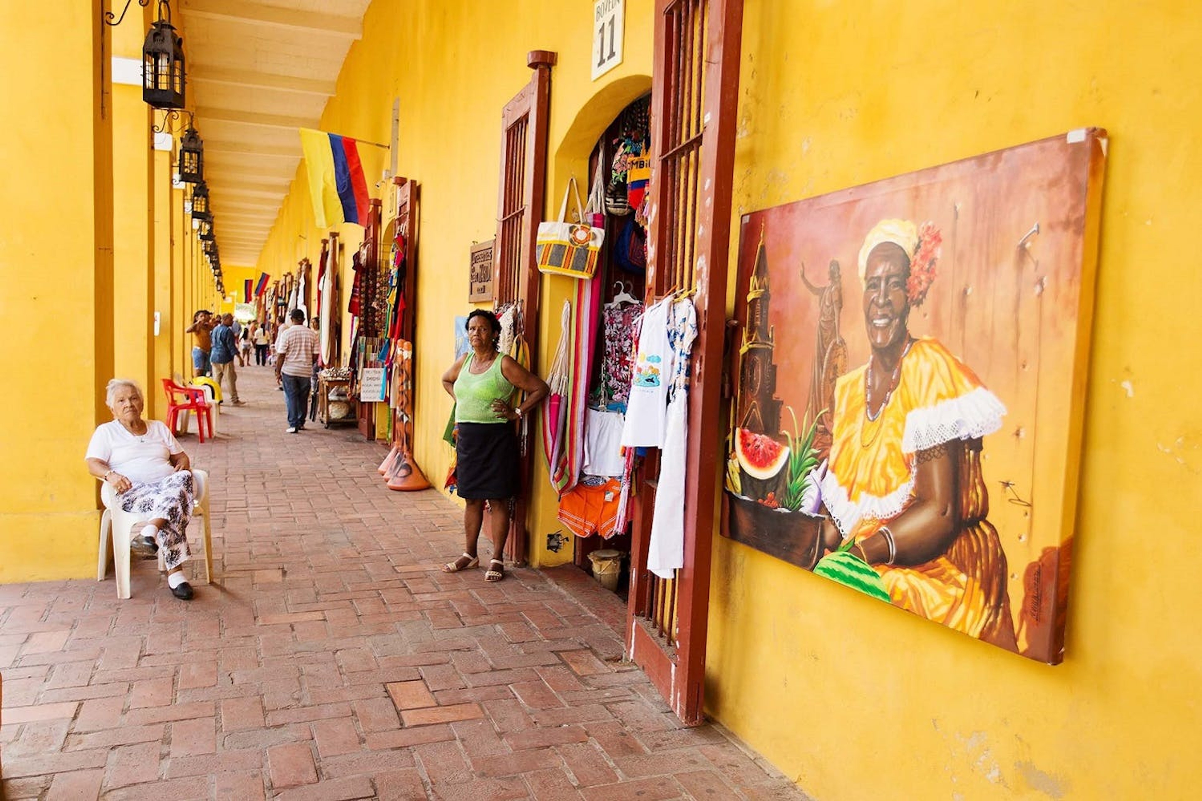 The colorful hues of Las Bovedas in Cartagena reflect the influence of the palenqueras' culture./Denis Elterman