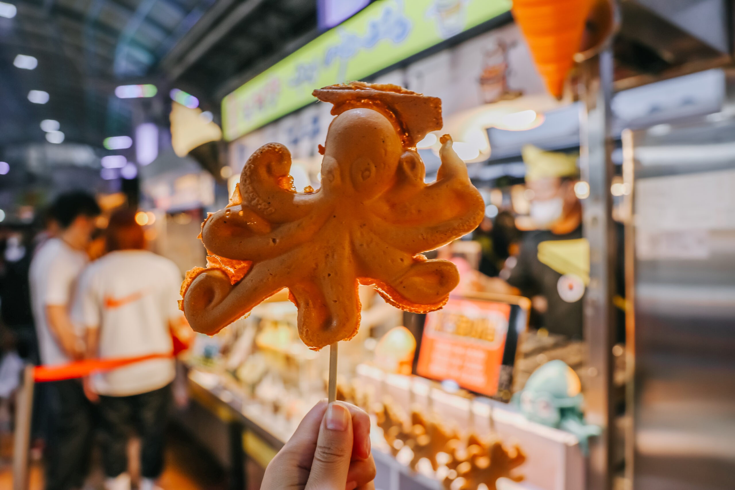 Squid-shaped bread filled with cheese at the Dongmun Night Market in Jeju/Getty Images