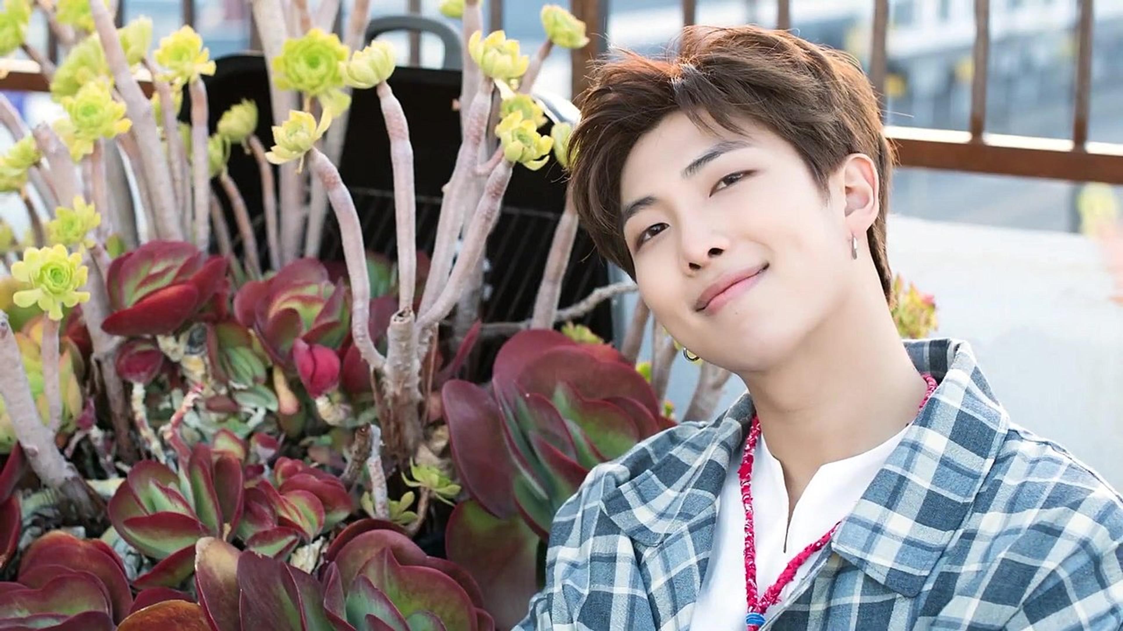 RM, pictured at Photo Shoot in Los Angeles in 2018, spoke at the UN General Assembly the previous year, saying, "We have learned to love ourselves, so now I urge you to 'speak yourself'"/Wikimedia Common photo by Dispatch