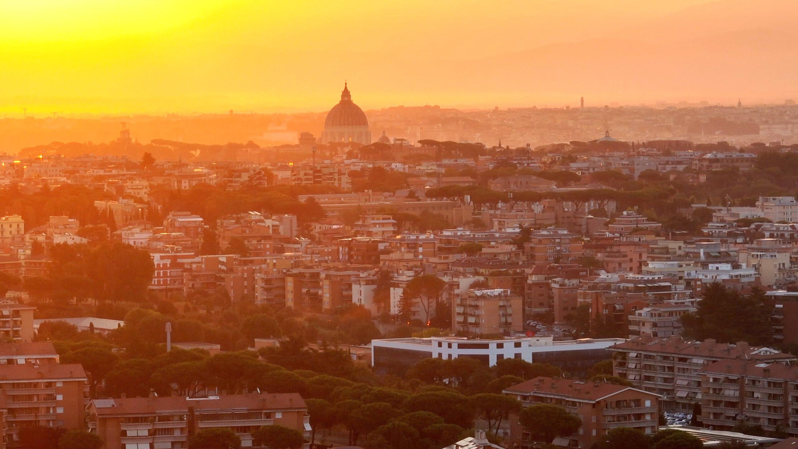 St. Peter's Basilica against the backdrop of Rome. Will the sun shine brightly on the Eternal City in this Jubilee year?/Getty Images