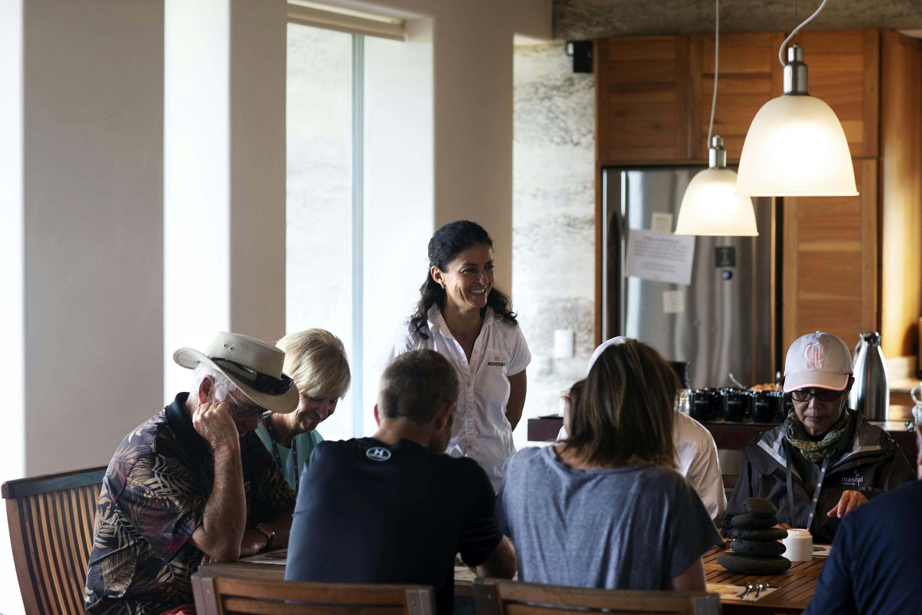 Reyna Oleas hosts Silversea guests at MonteMar coffee farm in Santa Cruz, Galapagos./Lucia Griggi