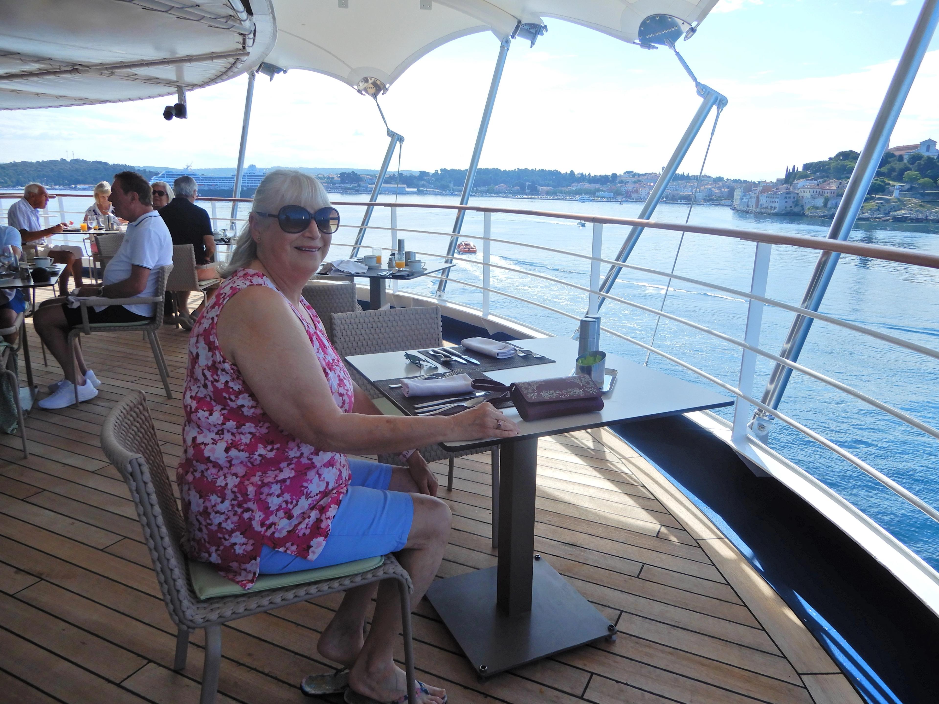 A magical moment aboard Silver Spirit overlooking the Croatian coastline is still memorable./Richard Anderson photo of his wife, Angie, for Silversea