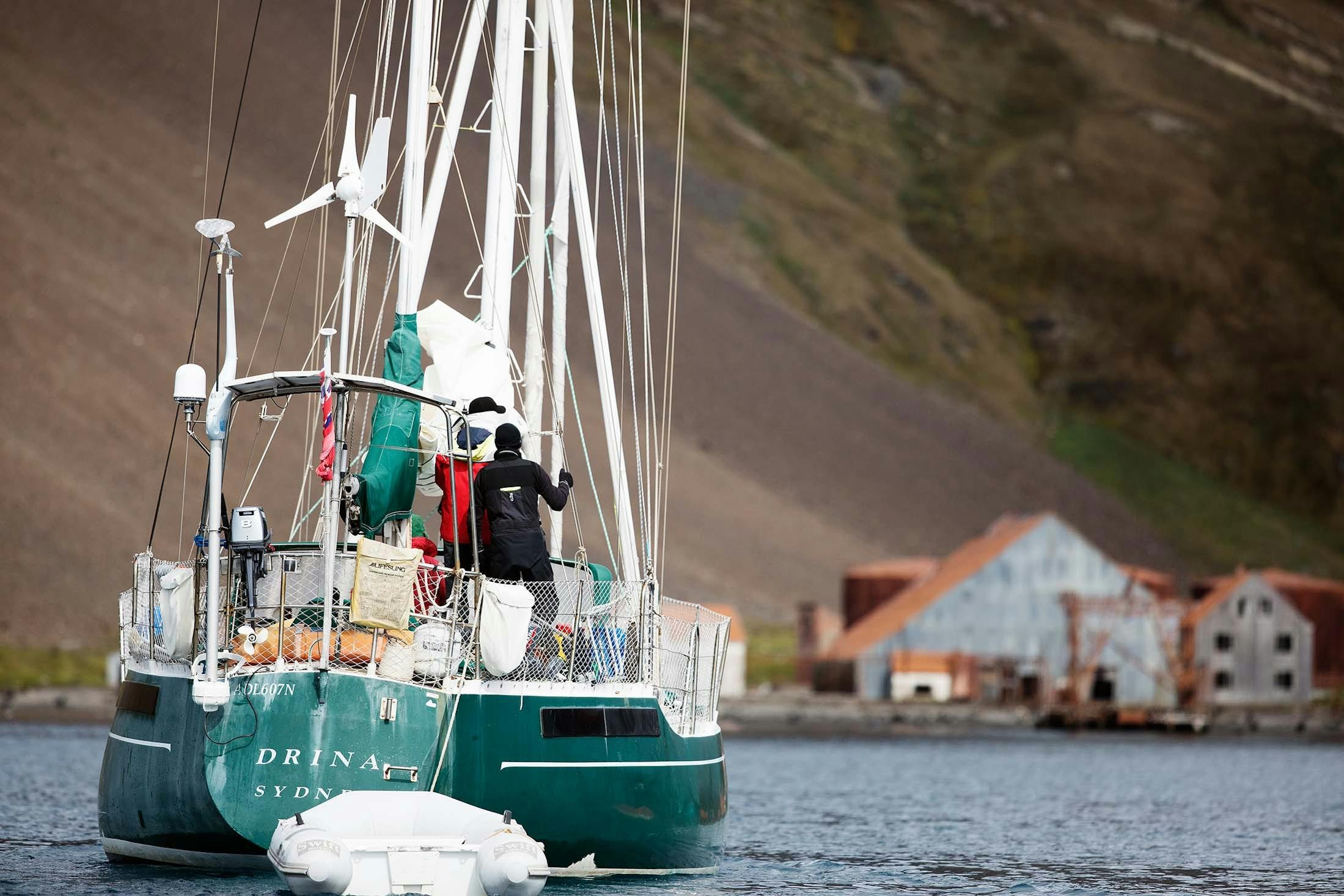 Sailors approach an old whaling station in Stromness./Lucia Griggi