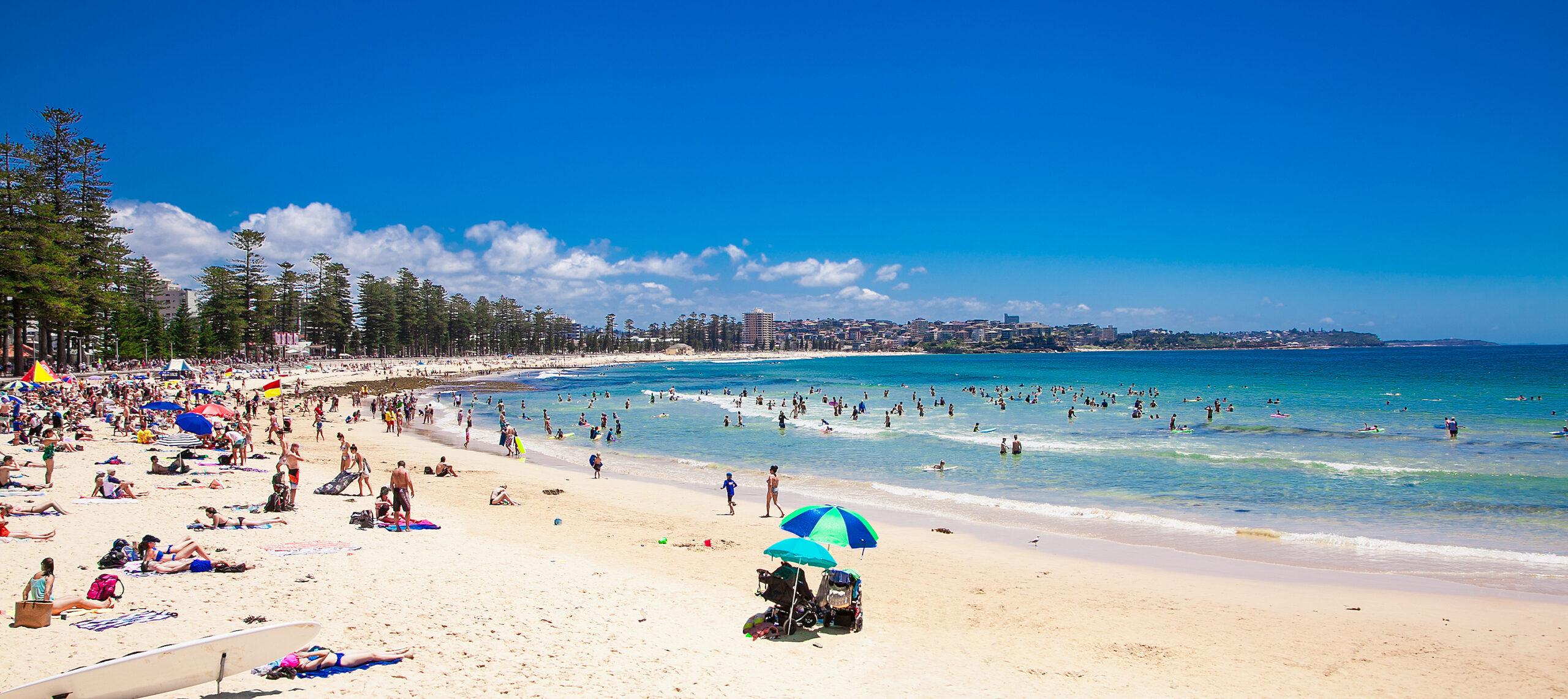People relaxing at main Manly Beach in Sydney, Australia.