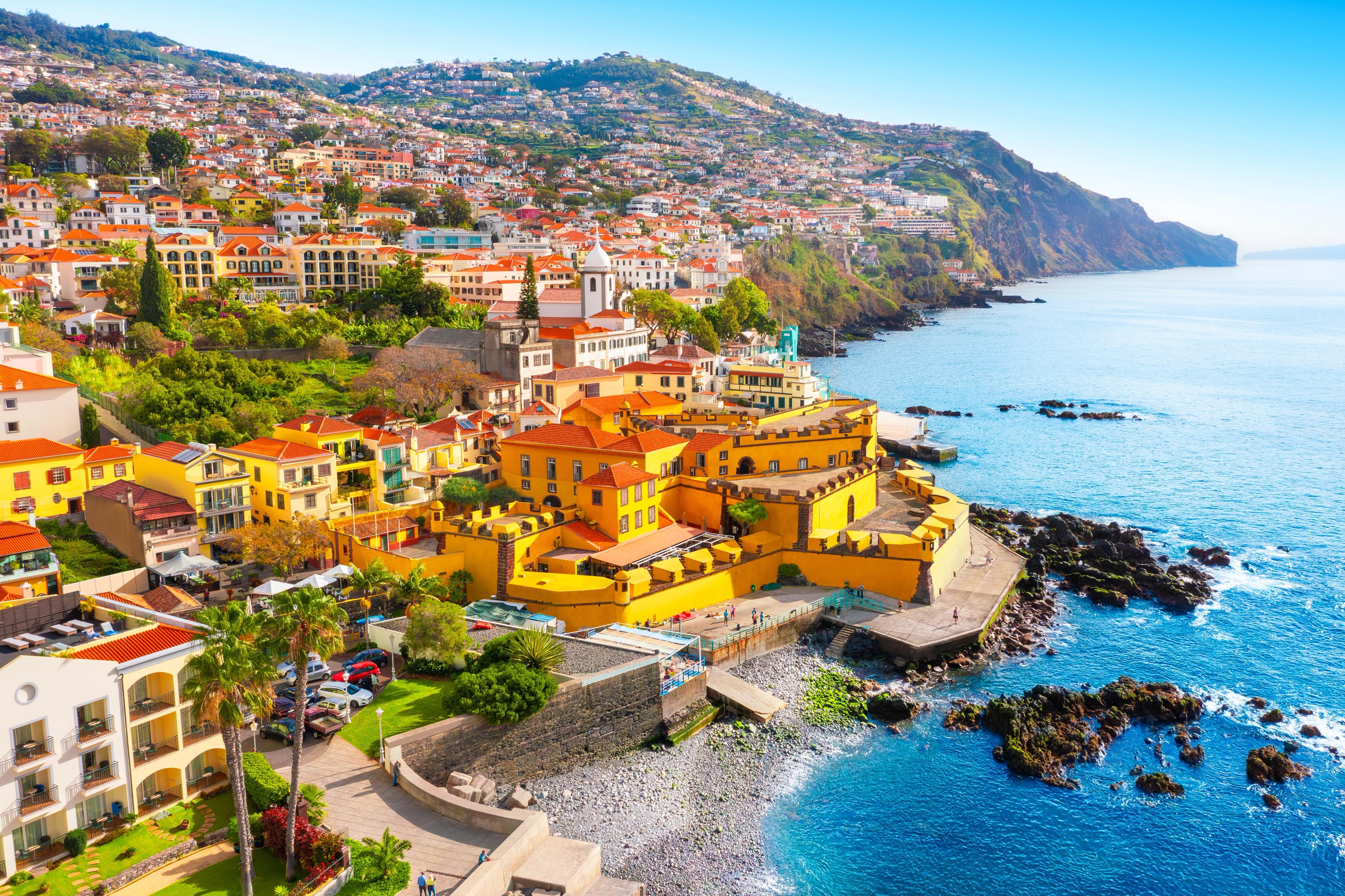 Funchal city of Madeira island Portugal with fortress on the coast of Atlantic Ocean.