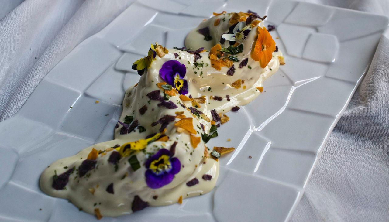 Cannelloni de suquet, the sixth of a seven-course menu created exclusively for S.A.L.T. guests. As the Modernist era dish, Xavi uses flower petals to mimic Antoni Gaudí's famous broken tiles./Xavi Morón