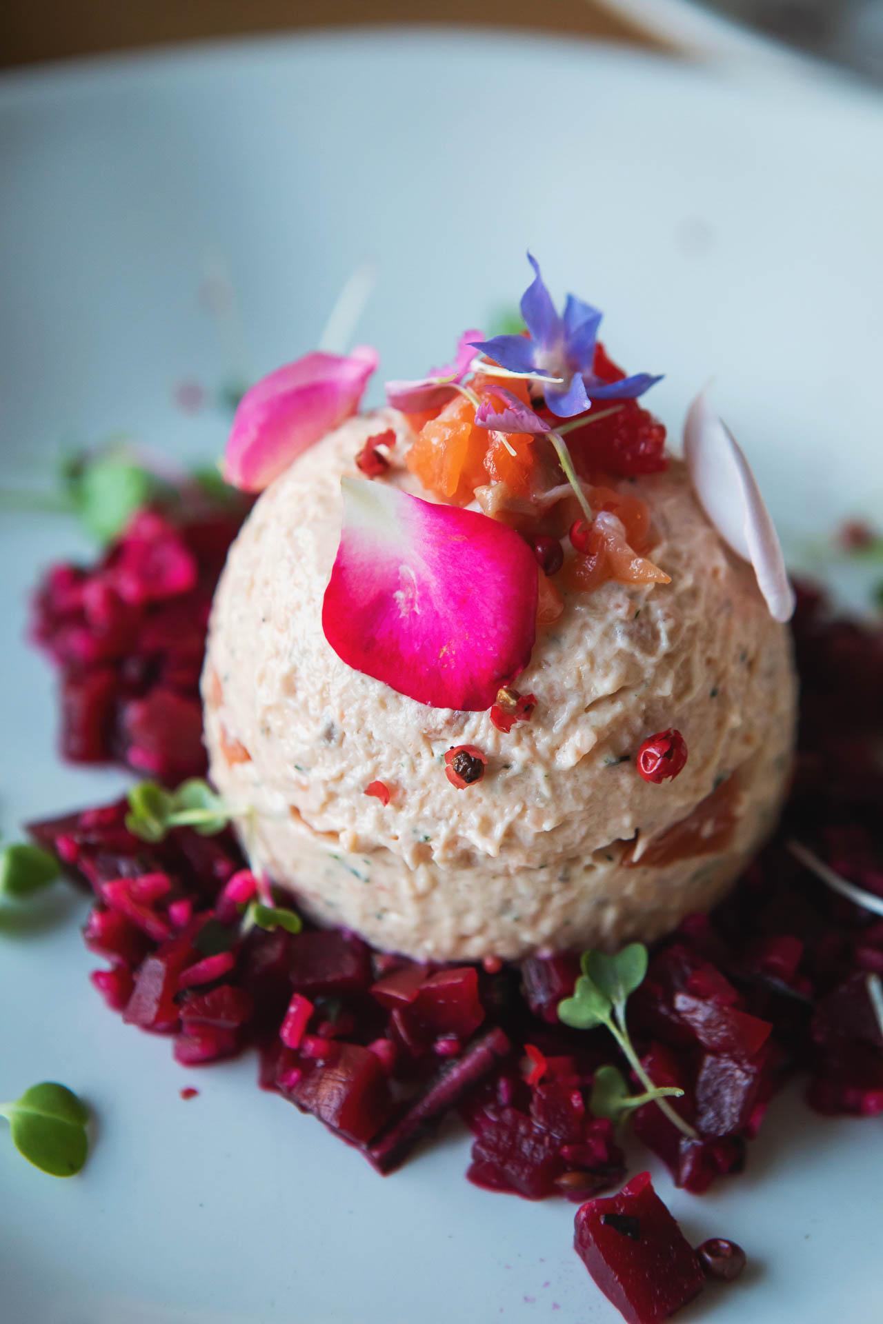 The cuisine served at Opera at the Quarry reflected South African traditions, like this dessert, decorated with candied protea, the national flower of South Africa.