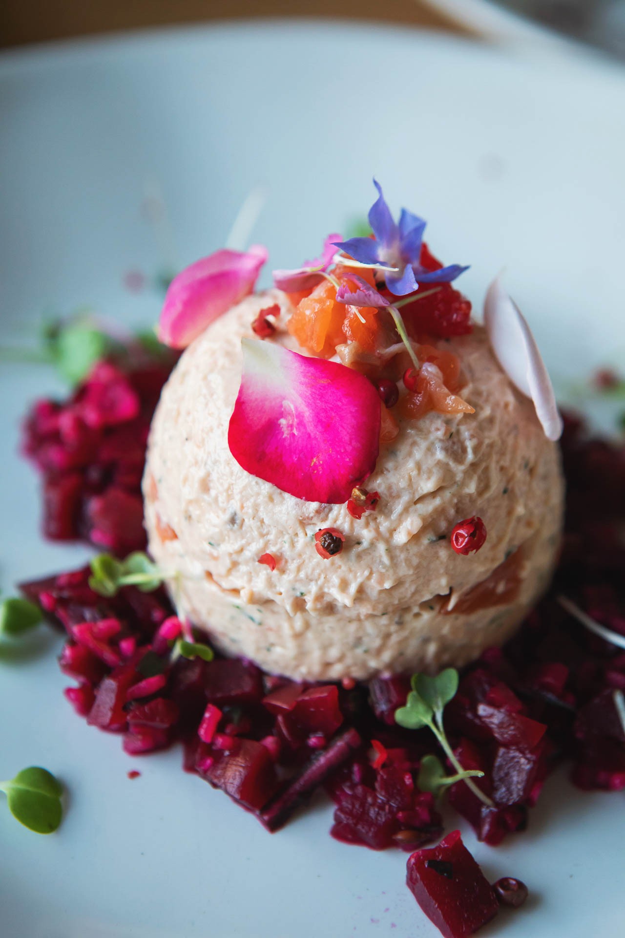 The cuisine served at Opera at the Quarry reflected South African traditions, like this dessert, decorated with candied protea, the national flower of South Africa.