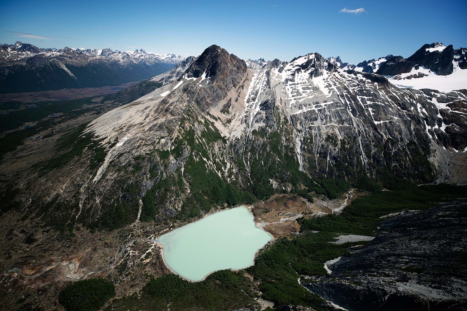 Set in a dramatic valley, the Emerald Lagoon attracts travelers from Ushuaia, Argentina, part of a 32-day trip./Silversea, Lucia Griggi