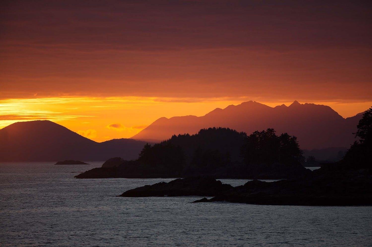 Offering perfect photography opportunities, vivid sunsets illuminate the skies over Baranof Island in Alaska./Lucia Griggi