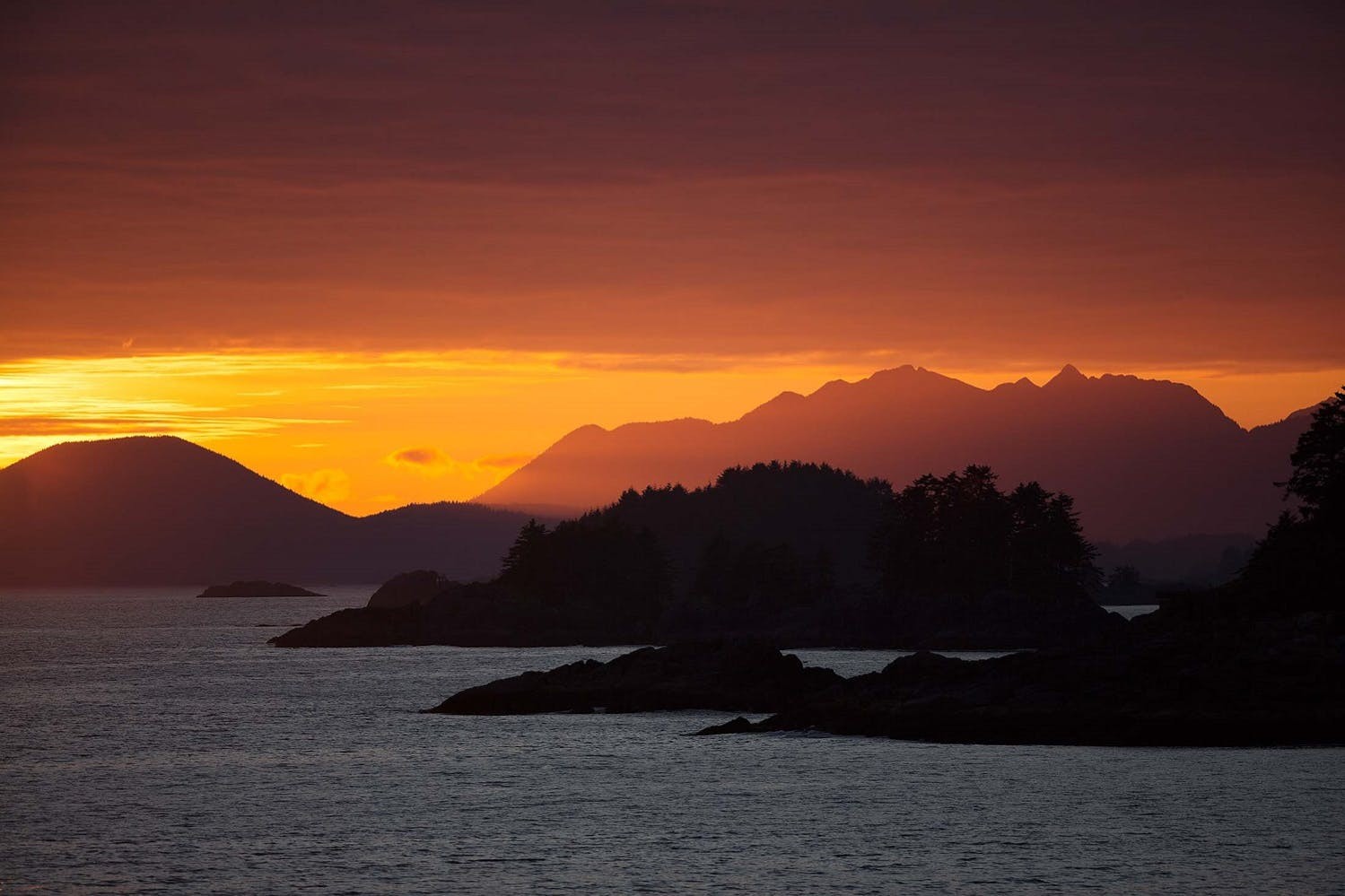 Offering perfect photography opportunities, vivid sunsets illuminate the skies over Baranof Island in Alaska./Lucia Griggi